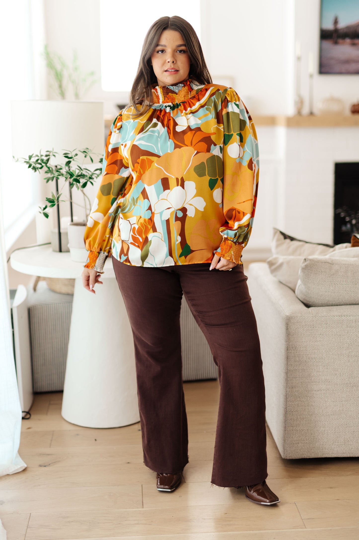 Long sleeve top by Jodifil
Poly Satin
Smocked Elastic Mock Neckline
Button Up Back Neckline
Smocked Elastic Sleeve Cuff
100% Polyester
True to Size