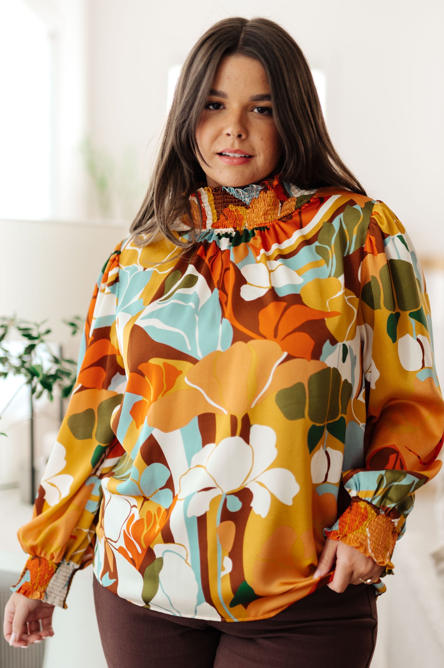 Long sleeve top by Jodifil
Poly Satin
Smocked Elastic Mock Neckline
Button Up Back Neckline
Smocked Elastic Sleeve Cuff
100% Polyester
True to Size