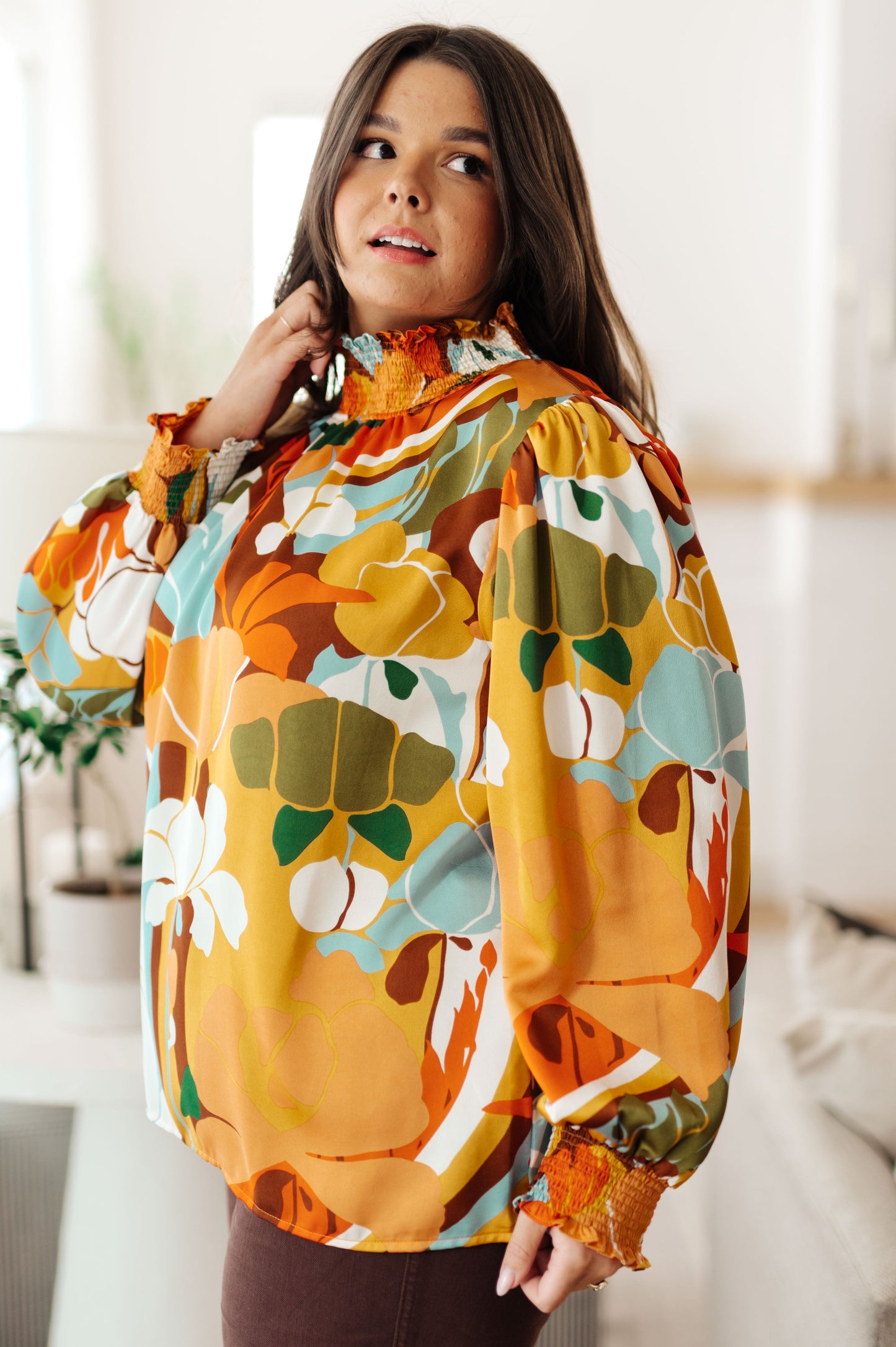 Long sleeve top by Jodifil
Poly Satin
Smocked Elastic Mock Neckline
Button Up Back Neckline
Smocked Elastic Sleeve Cuff
100% Polyester
True to Size