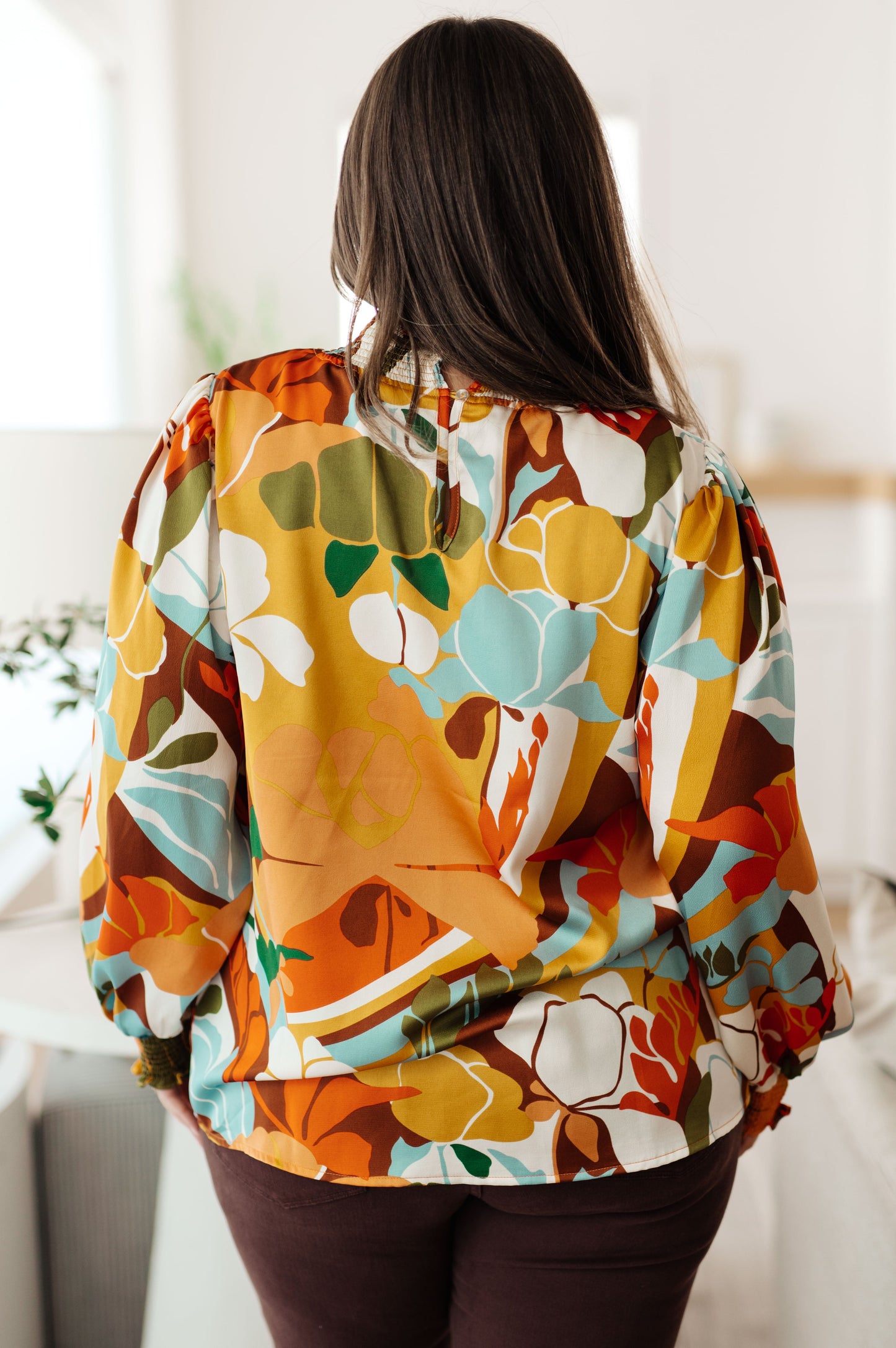 Long sleeve top by Jodifil
Poly Satin
Smocked Elastic Mock Neckline
Button Up Back Neckline
Smocked Elastic Sleeve Cuff
100% Polyester
True to Size