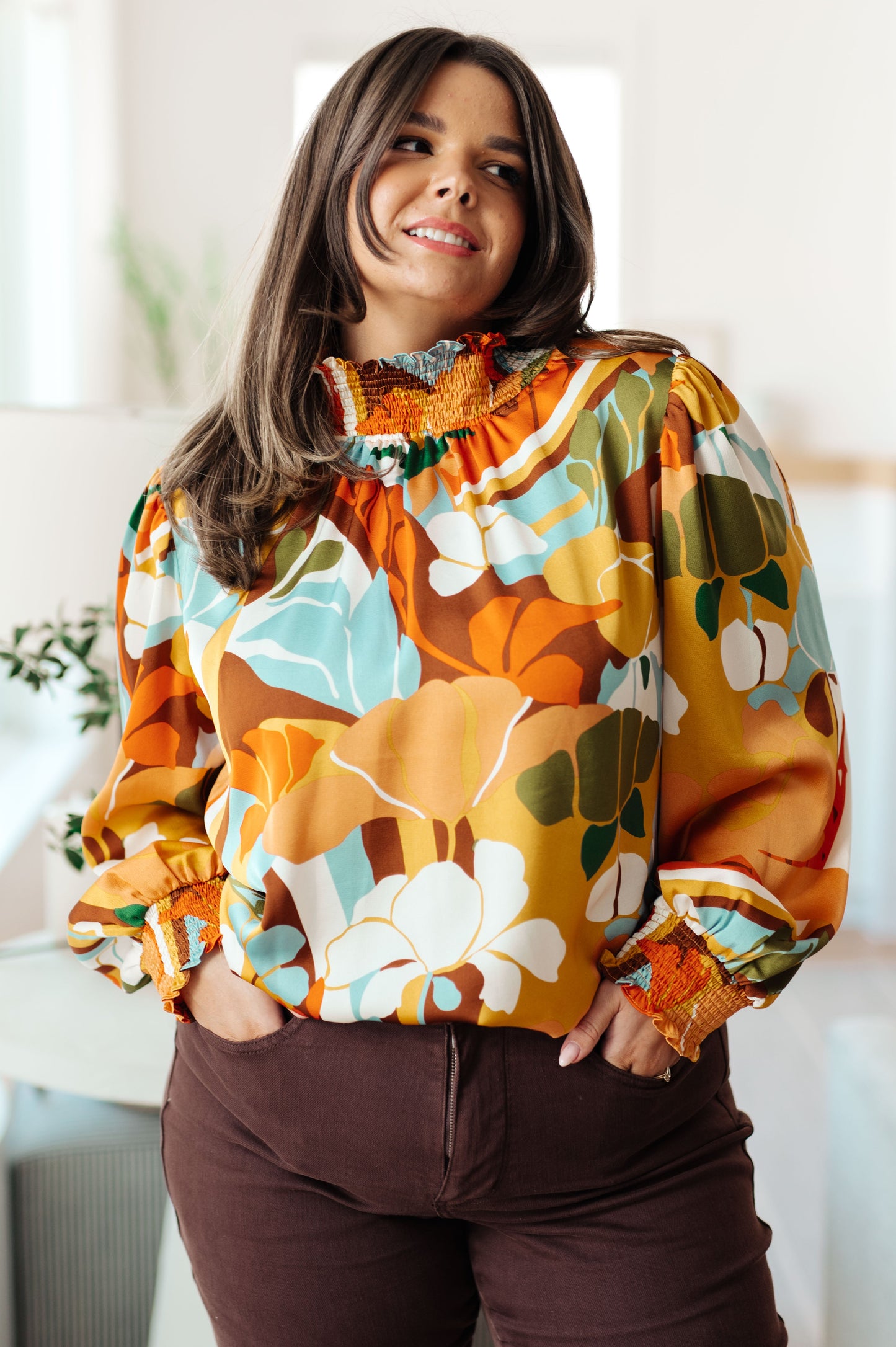 Long sleeve top by Jodifil
Poly Satin
Smocked Elastic Mock Neckline
Button Up Back Neckline
Smocked Elastic Sleeve Cuff
100% Polyester
True to Size