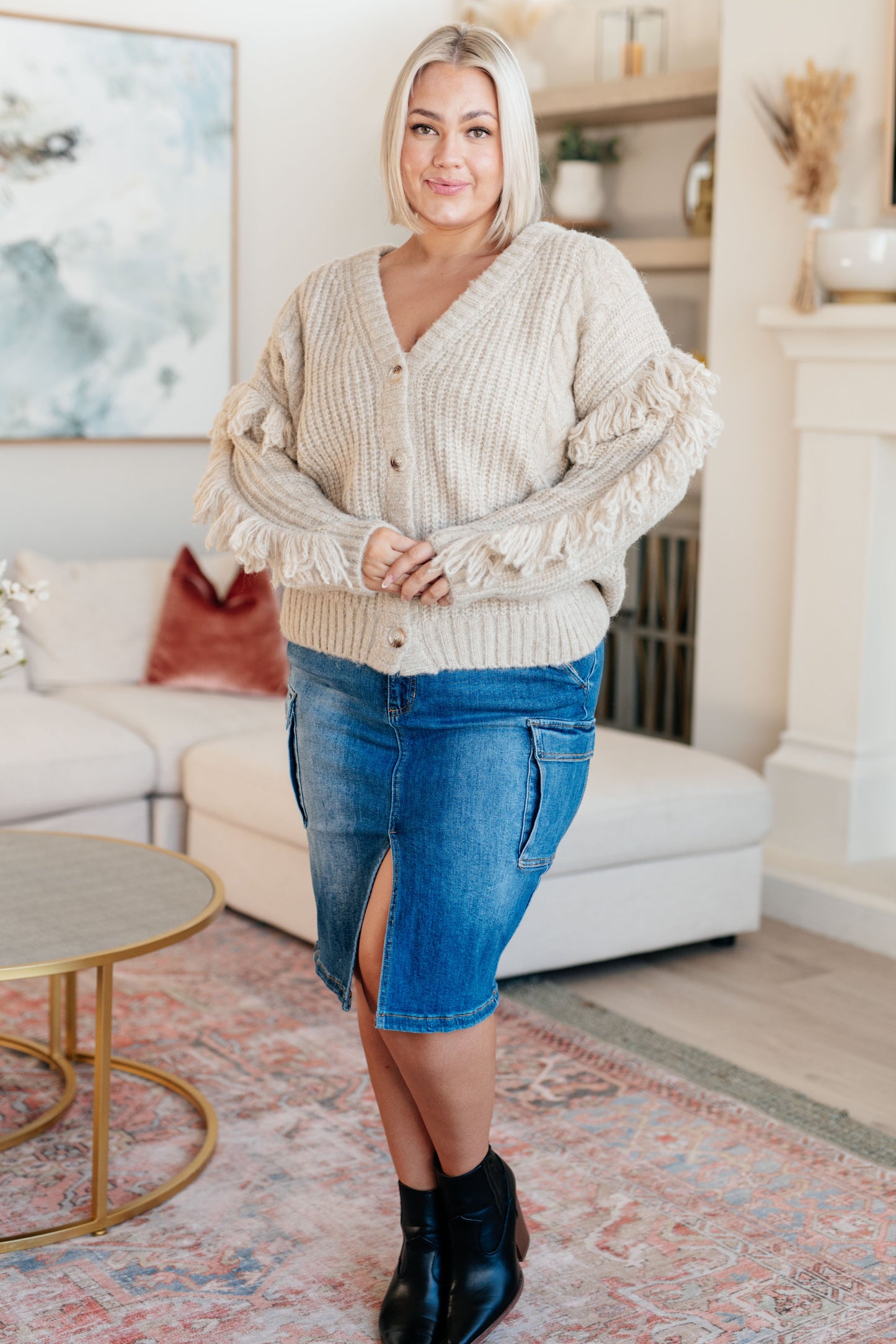 Beige long sleeve Mid-Weight sweater Sweater Knit
V-Neckline
Looped Fringe
Button Front
50% Recycled Acrylic, 50% Acrylic
True to Size