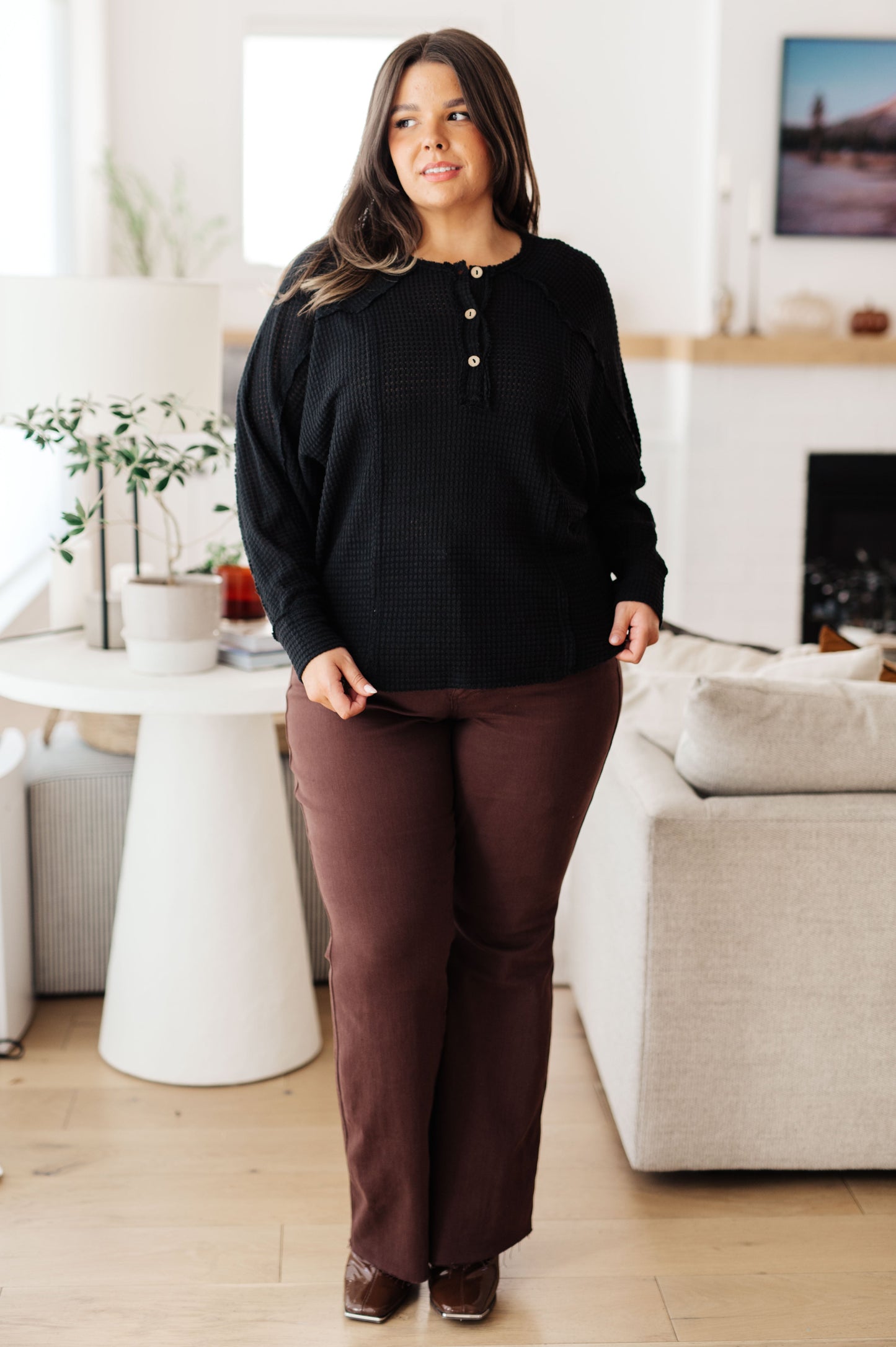 Black long sleeve Henley top by Sew in Love
Waffle Knit
Round Neckline
Button Up Henley
Relaxed Fit
64% Polyester, 34% Rayon, 2% Spandex
True to Size