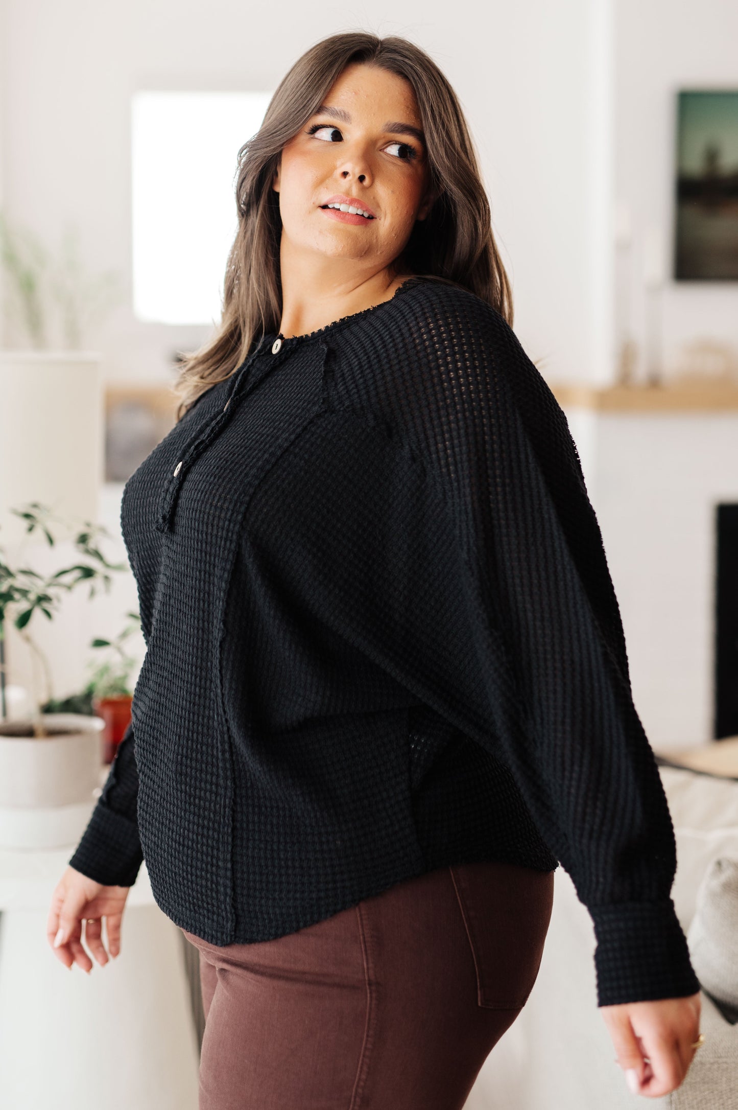Black long sleeve Henley top by Sew in Love
Waffle Knit
Round Neckline
Button Up Henley
Relaxed Fit
64% Polyester, 34% Rayon, 2% Spandex
True to Size