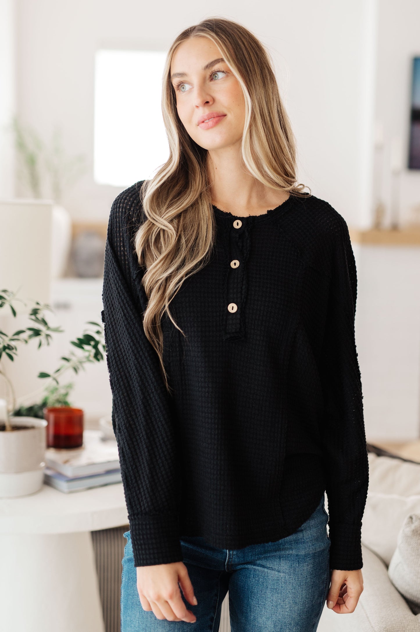 Black long sleeve Henley top by Sew in Love
Waffle Knit
Round Neckline
Button Up Henley
Relaxed Fit
64% Polyester, 34% Rayon, 2% Spandex
True to Size