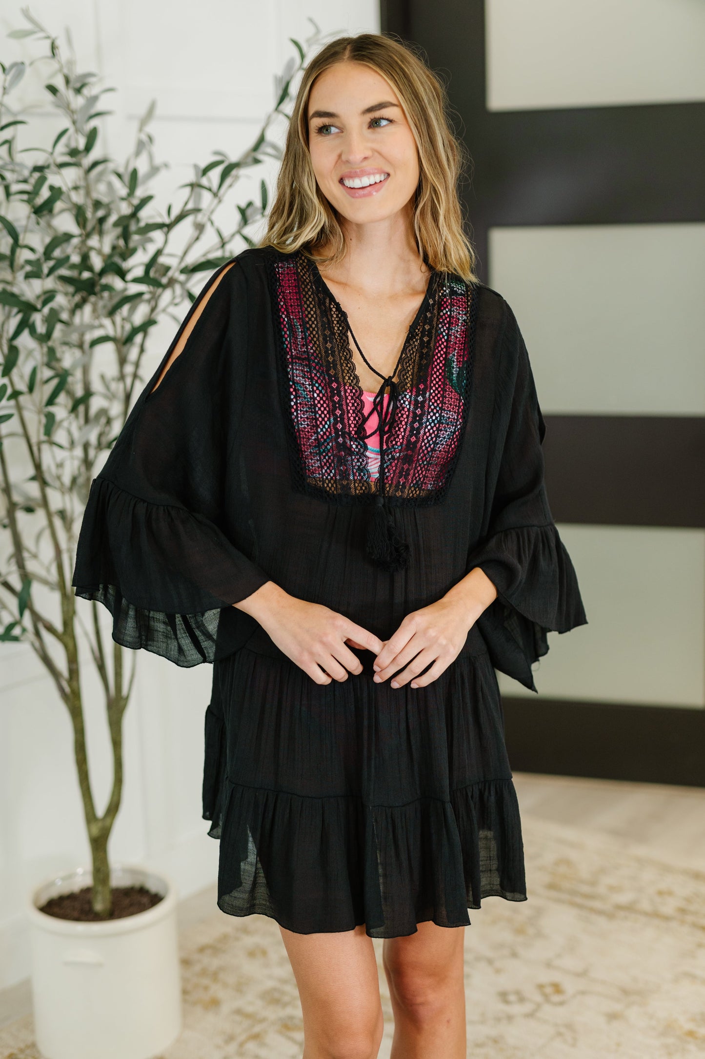 Black Sheer Lightweight Woven Swim Cover Up
No-Stretch
V-Neckline
Functional Neck Tie
Lace Details
Shoulder Cutout
Tiered
Ruffle Sleeve Cuff
100% Polyester
True to Size
