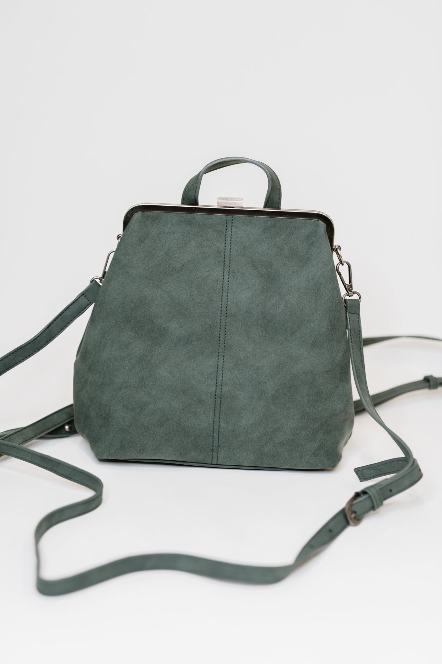Backpack in Peacock
10.5″ Tall
9″ Wide
4″ Deep
Brass Plated Clasp Closure At Top
22" Adjustable and Removable Crossbody Strap
16" Adjustable and Removable Backpack Strap
Vertical Zipper Closure In Back
Zipper Closure Pocket Inside
Floral Printed Lining
100% Vegan Leather