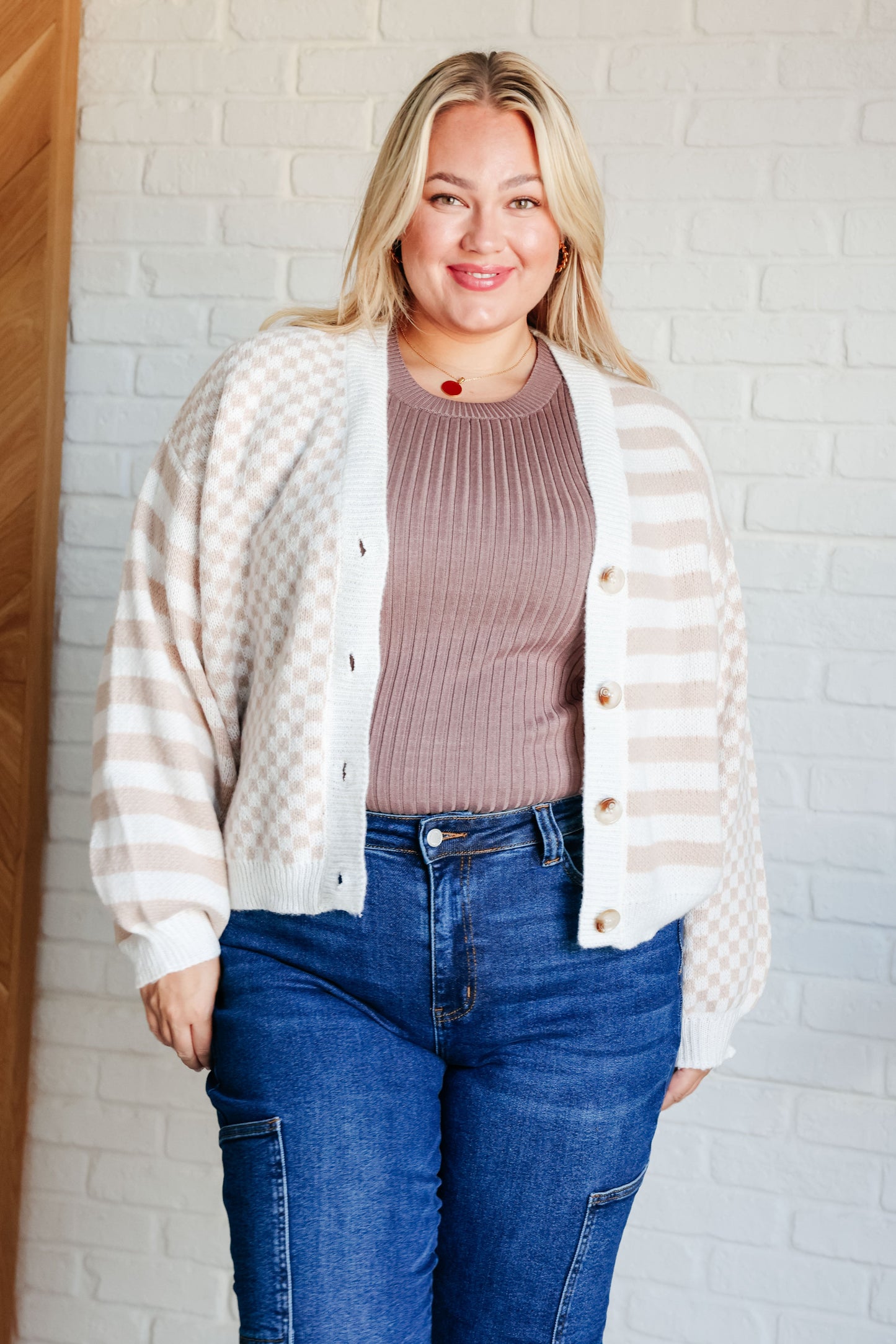 Striped and Checker Midweight Sweater Cardigan by Bibi
Knit
Ribbed Knit Trim
V-Neckline
Button Front
Dropped Shoulder
100% Polyester
True to Size