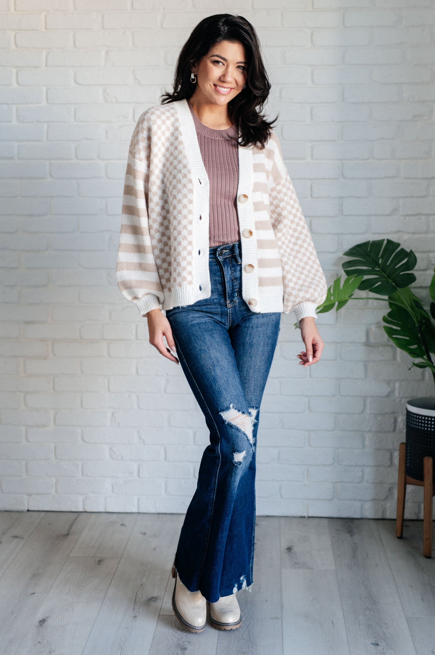 Striped and Checker Midweight Sweater Cardigan by Bibi
Knit
Ribbed Knit Trim
V-Neckline
Button Front
Dropped Shoulder
100% Polyester
True to Size