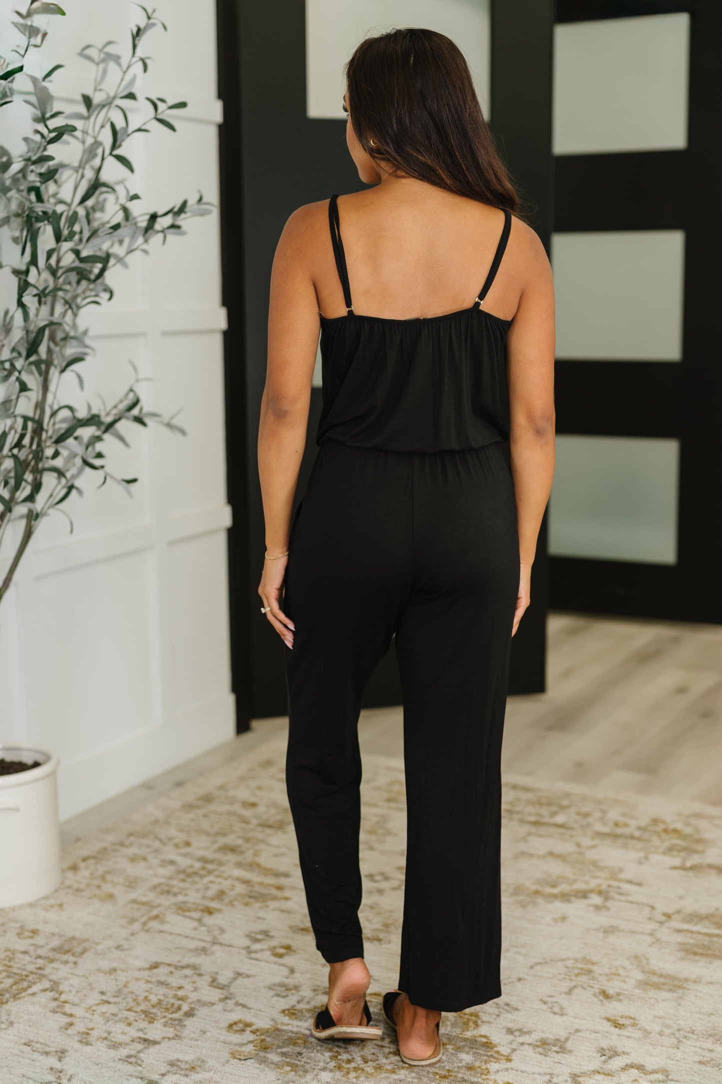 Black Jersey Knit Jumpsuit
Adjustable Spaghetti Straps
Surplice Front
Tacked Bustline
Elastic Waistband
Pockets
Wide Leg Silhouette
95% Rayon 5% Spandex
True to Size