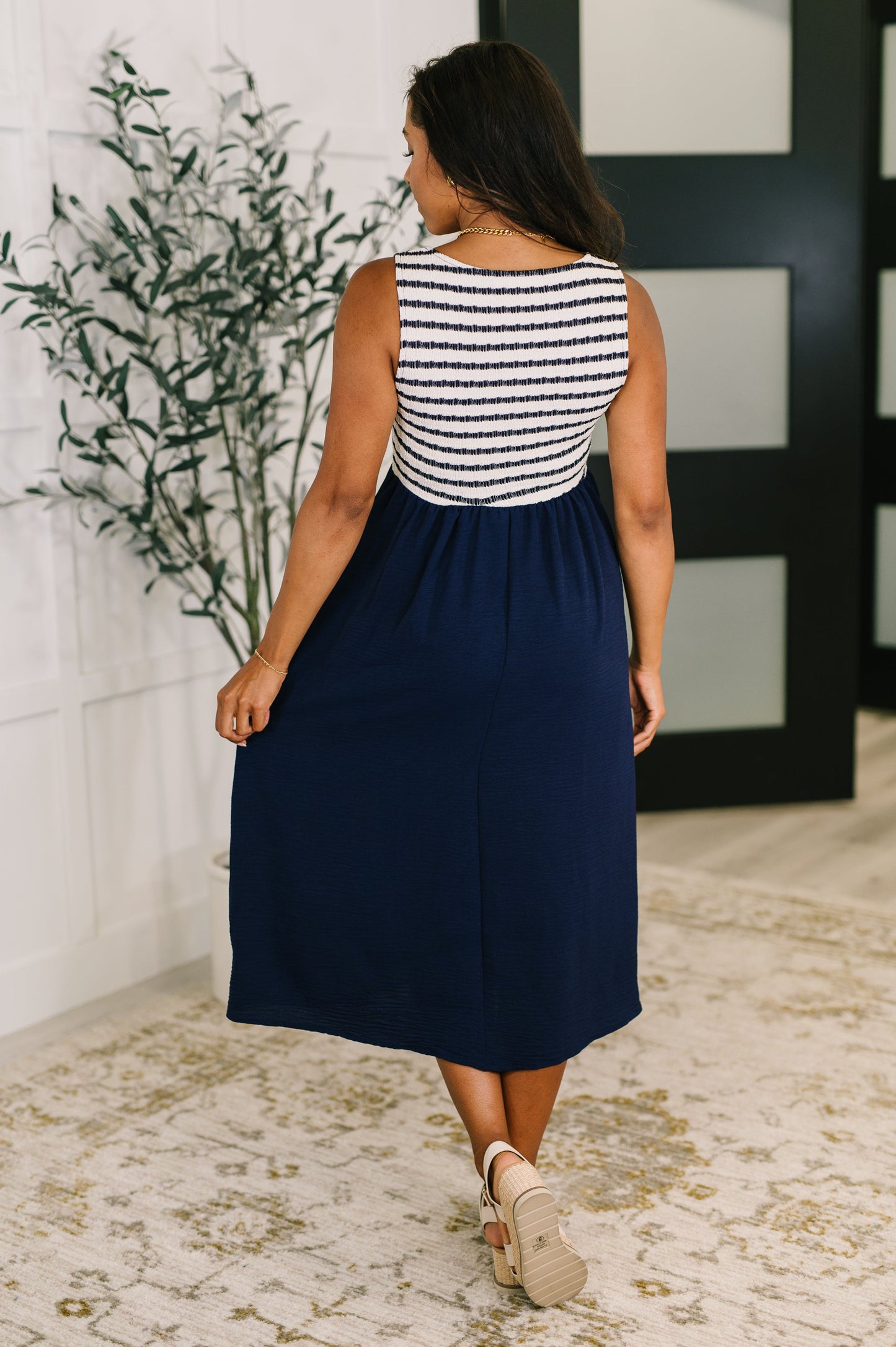 Striped top and navy dress
Texture Knit Bodice
High Stretch Bodice
Square Neckline
Crinkle Woven Skirt
Functional Side Pockets
100% Polyester
True to Size