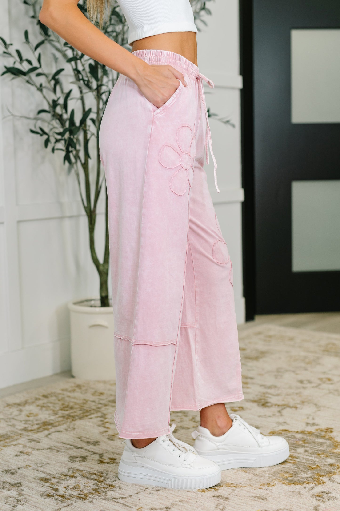 Light Pink cropped flare pants with flower applique design