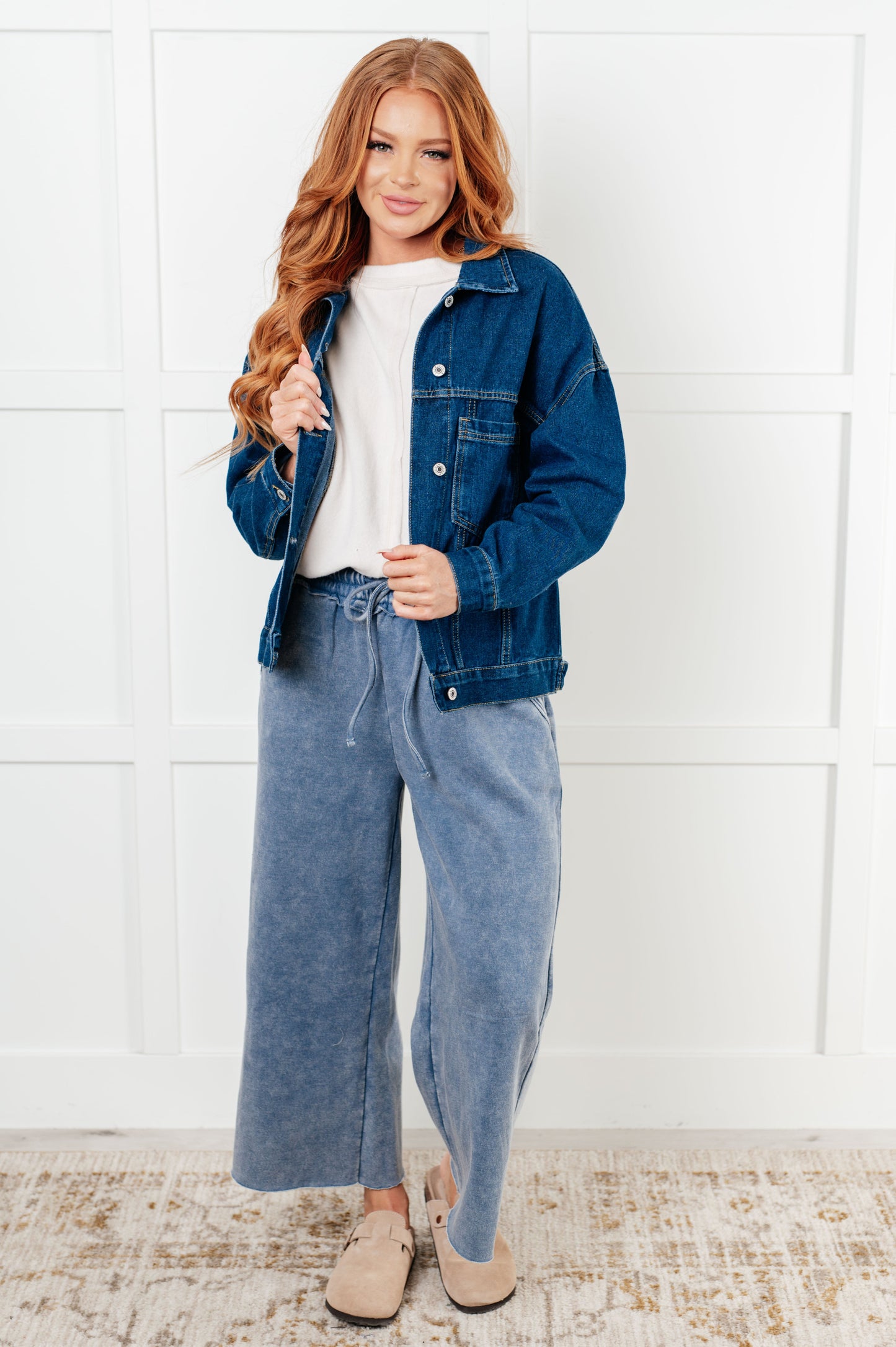 Denim Jacket
Collared Neckline
Full Front Button Closures
Functional Chest Patch Pockets
Sleeve Cuff Button Closure
Back Pleat Detail
75% Cotton, 25% Polyester
True to Size