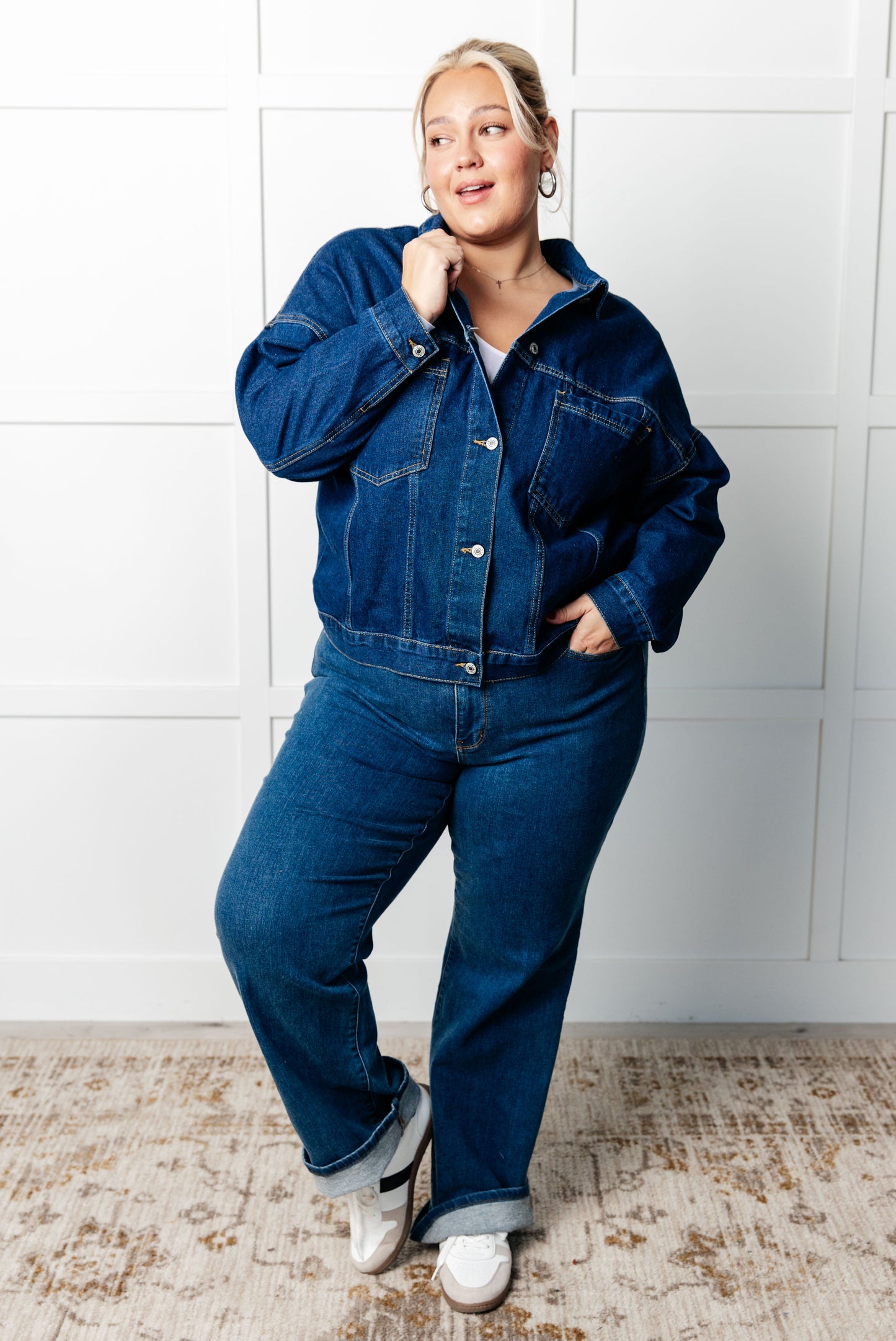 Denim Jacket
Collared Neckline
Full Front Button Closures
Functional Chest Patch Pockets
Sleeve Cuff Button Closure
Back Pleat Detail
75% Cotton, 25% Polyester
True to Size