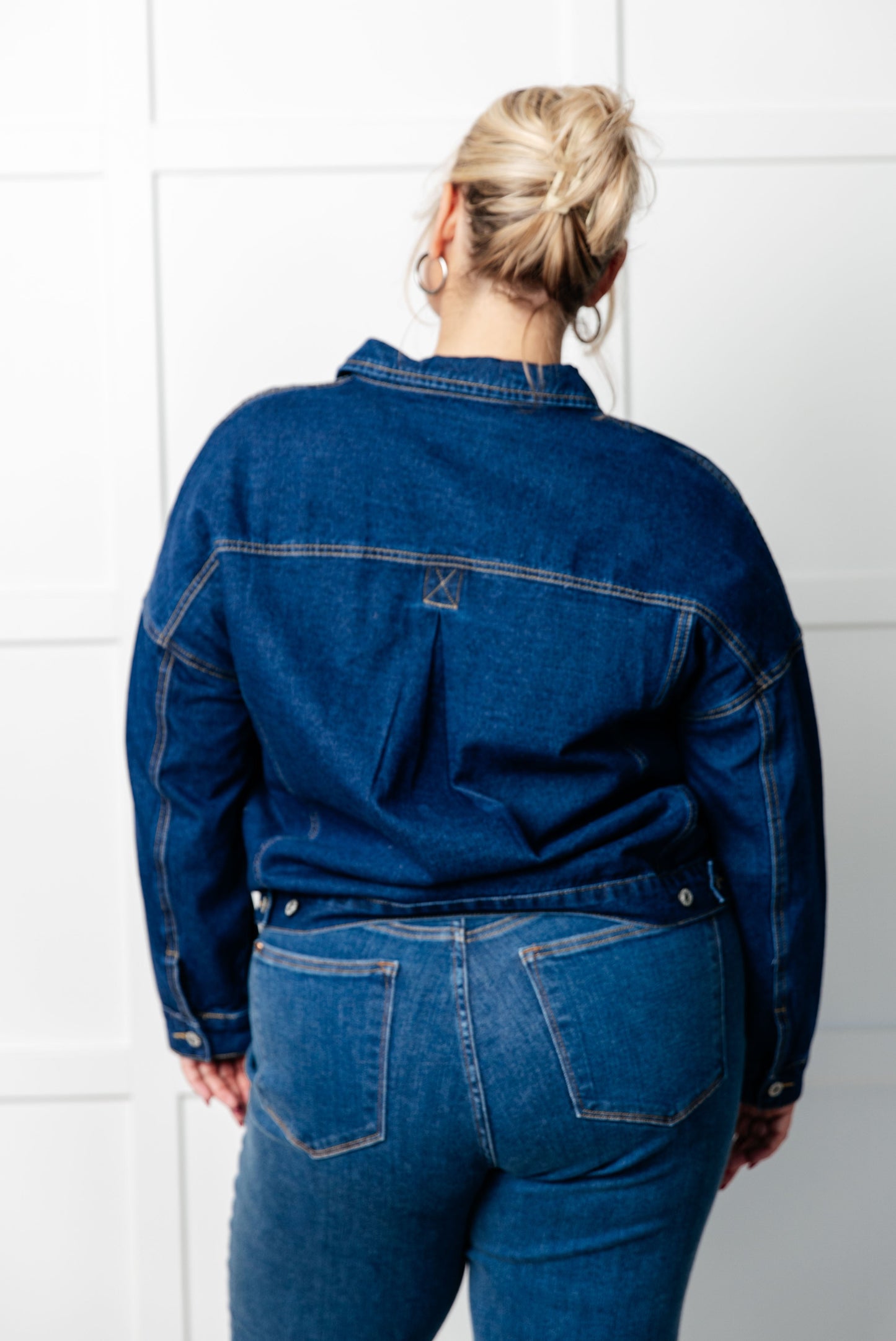 Denim Jacket
Collared Neckline
Full Front Button Closures
Functional Chest Patch Pockets
Sleeve Cuff Button Closure
Back Pleat Detail
75% Cotton, 25% Polyester
True to Size