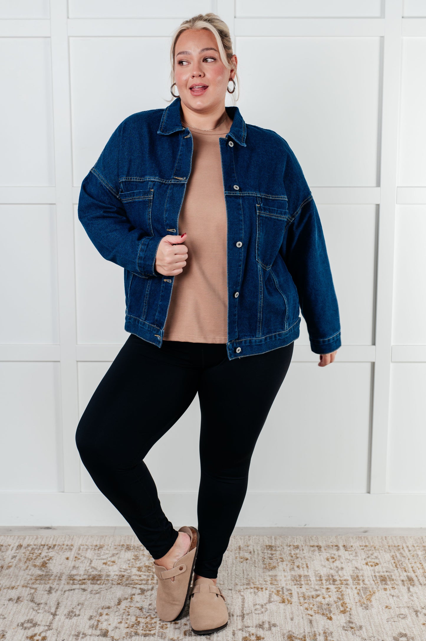 Denim Jacket
Collared Neckline
Full Front Button Closures
Functional Chest Patch Pockets
Sleeve Cuff Button Closure
Back Pleat Detail
75% Cotton, 25% Polyester
True to Size