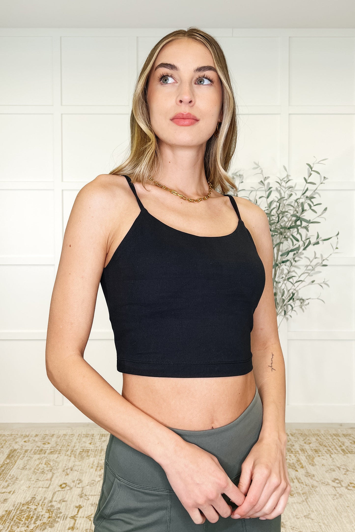 84% Polymicrofiber, 16% Spandex
Built in Shelf Bra with Removable Pads
Adjustable Straps
Cropped Tank
High Stretch
Brushed Microfiber
Black Yoga tank top by Rae Mode