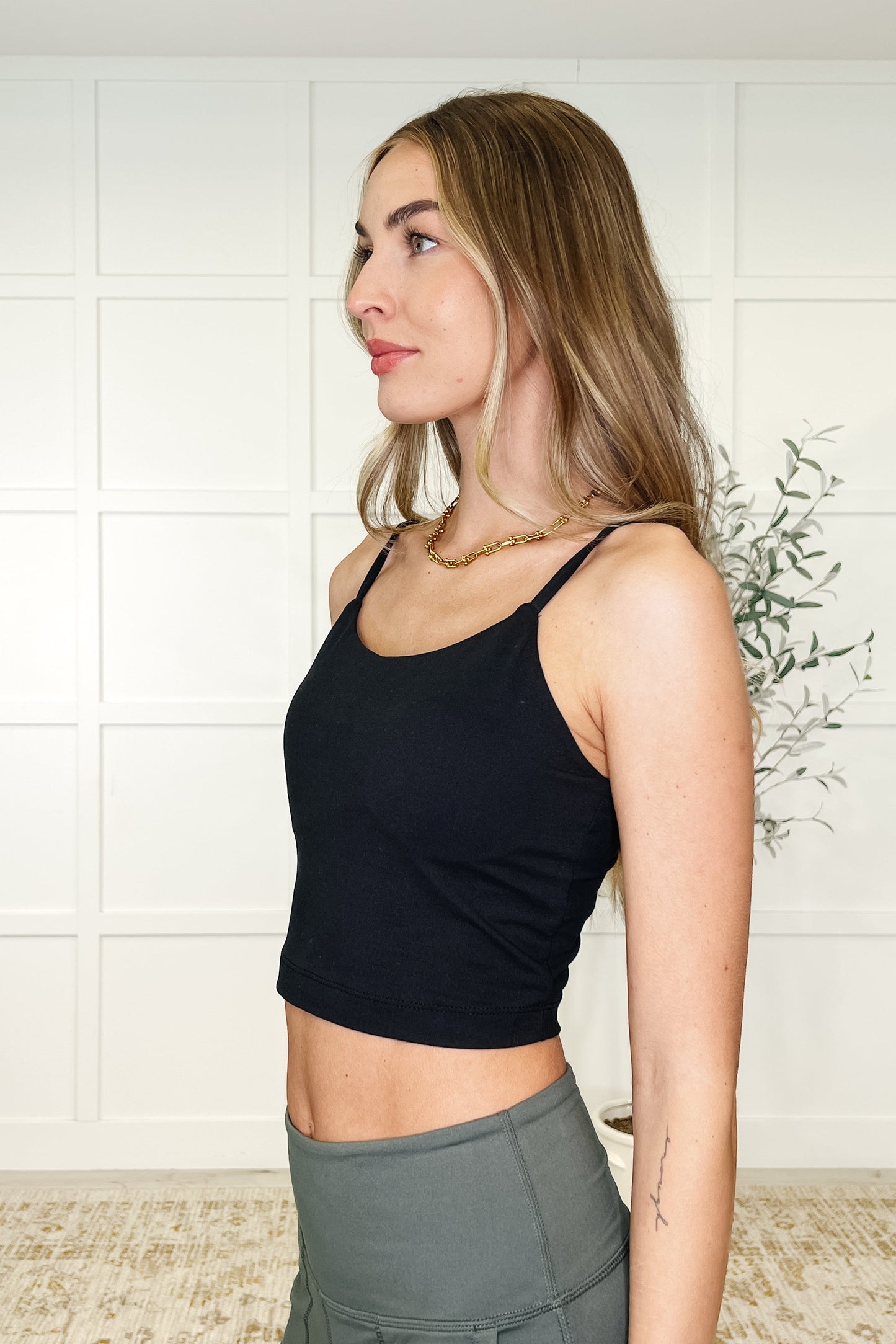84% Polymicrofiber, 16% Spandex
Built in Shelf Bra with Removable Pads
Adjustable Straps
Cropped Tank
High Stretch
Brushed Microfiber
Black Yoga tank top by Rae Mode