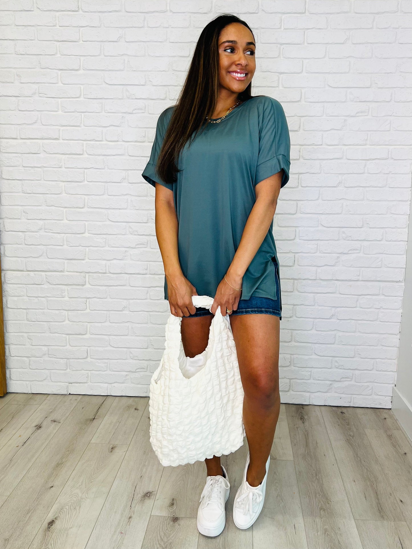 A cream-colored, textured tote bag