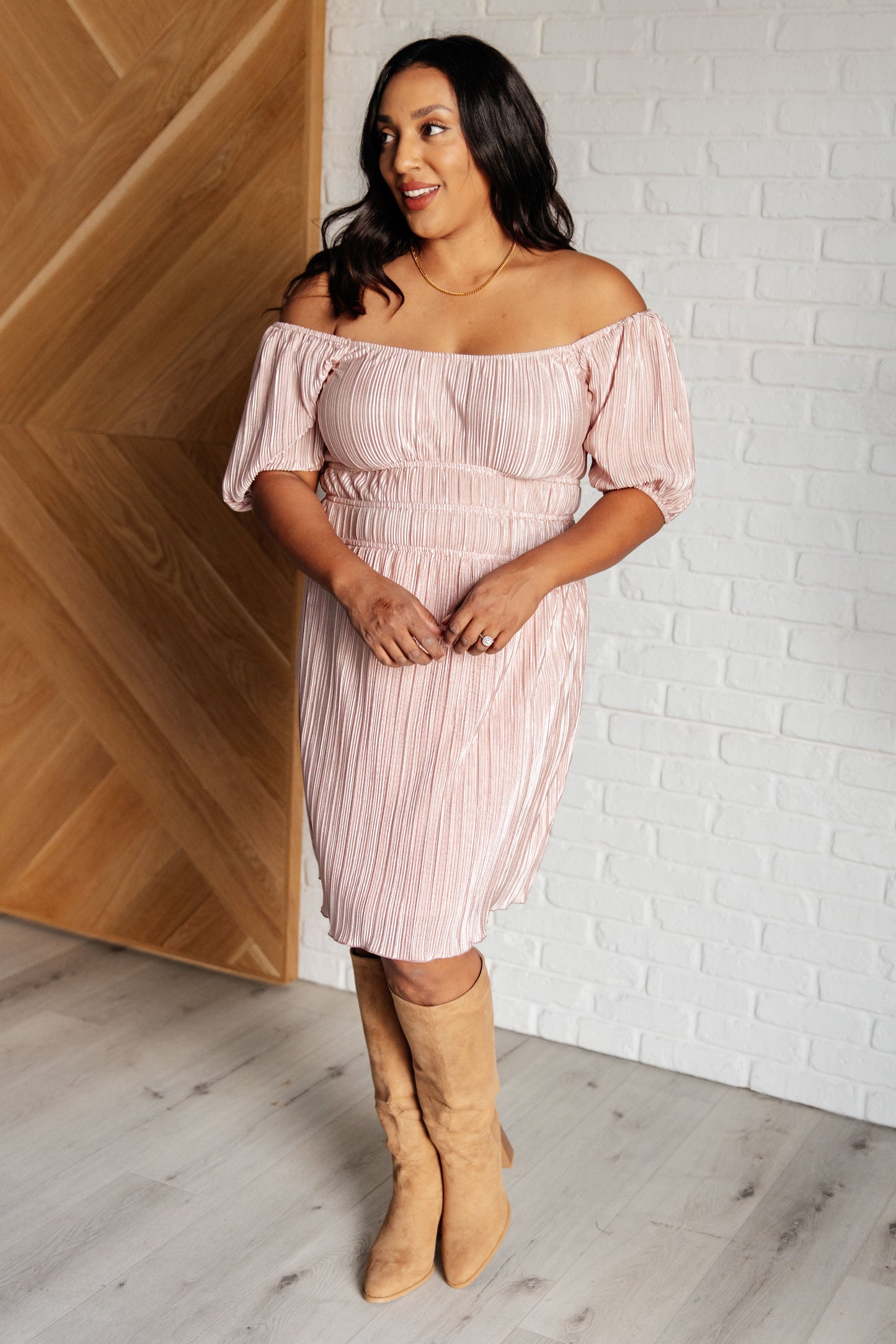 Pink Poly Satin short sleeved dress
Plisse
Cased Elastic Shoulder
Scoop Neck/Off Shoulder
Balloon Sleeve
Cased Elastic Sleeve Cuff
Cased Elastic Waistline
Lined Skirt
Self and Lining: 100% Polyester
True to Size