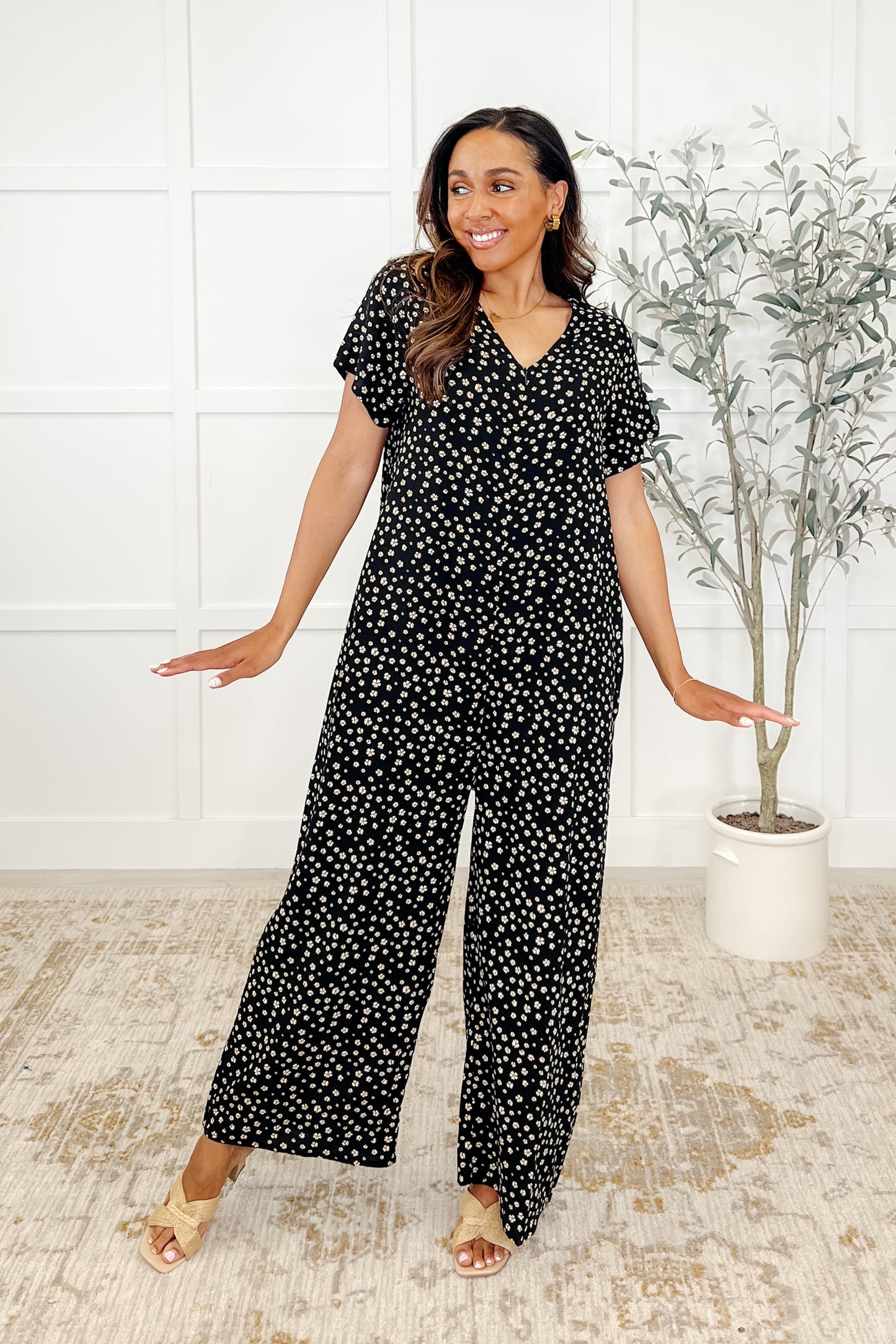 Black V neck, front zipper, relaxed fit, wide leg, side pockets, plus size jumpsuit