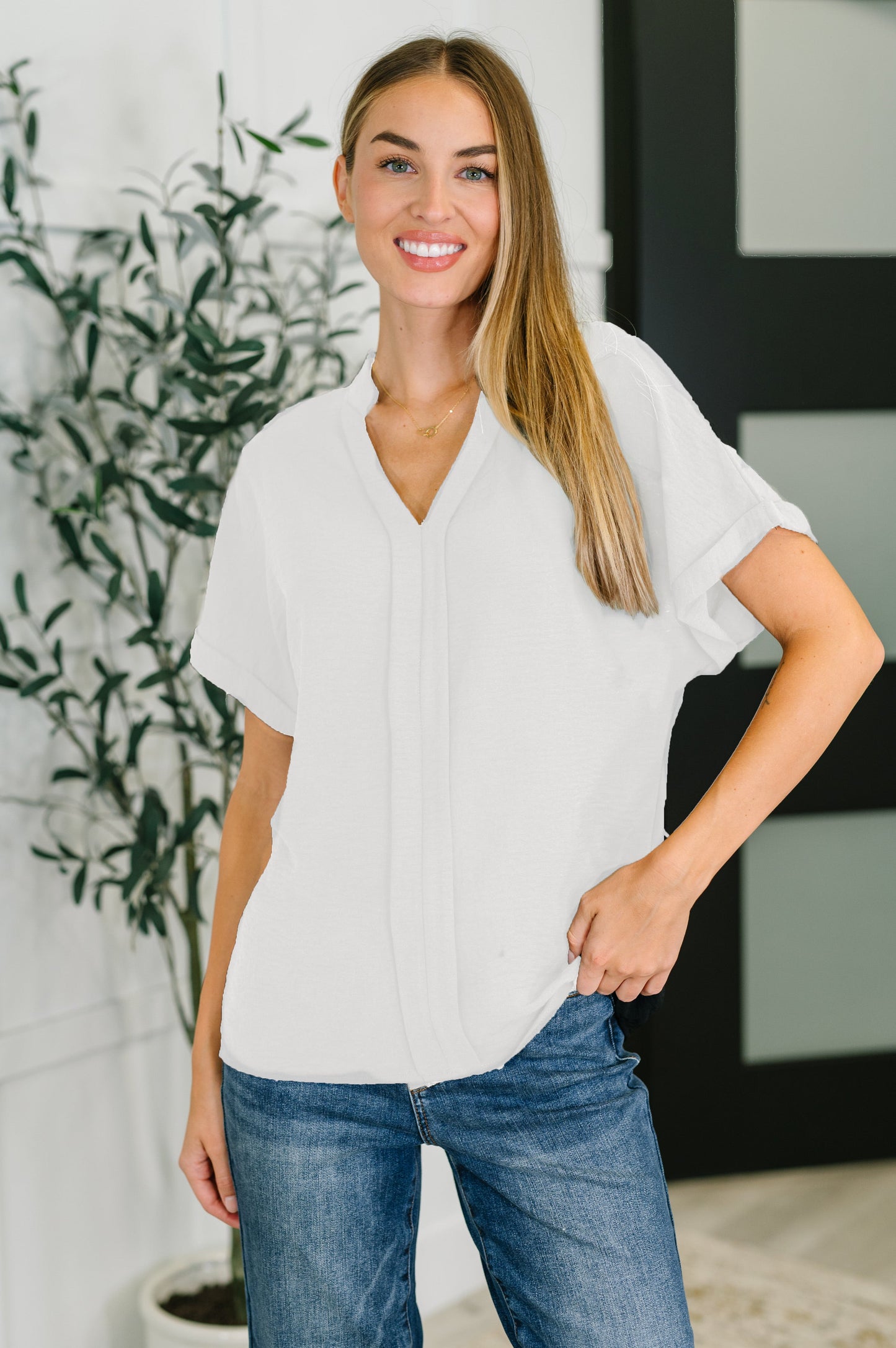 White, crinkle woven V neck short sleeve blouse