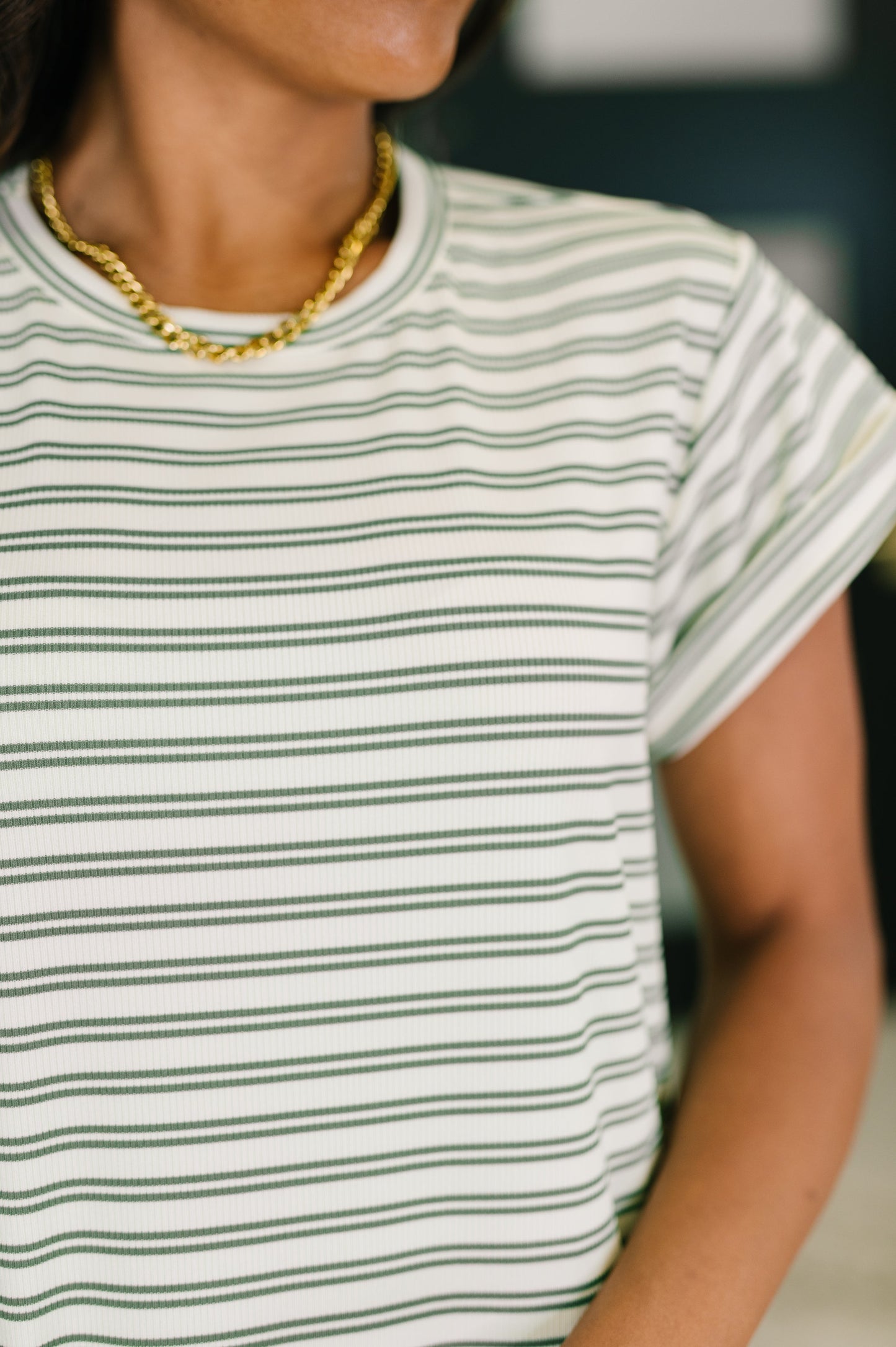 Green and white striped dress
Ribbed Knit
High Stretch
Banded, Round Neckline
Cuffed and Tacked Sleeve
Side Slit
95% Polyester, 5% Spandex
True to Size