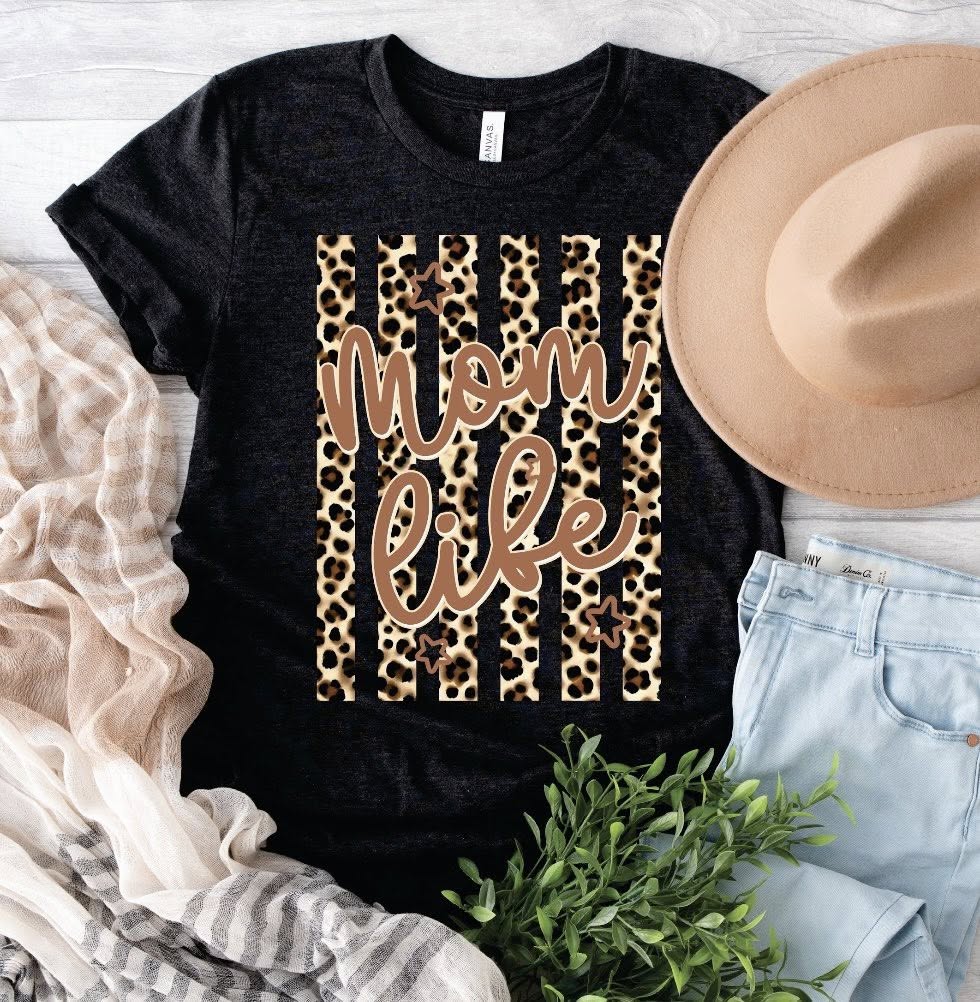 Cool Moms Club pink graphic t-shirt on Bella Canvas tee styled with jeans and sneakers