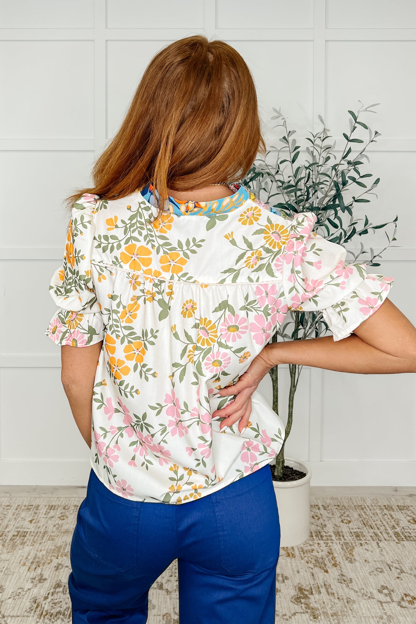 Lightweight Poplin Woven
V-Neckline
Machine Embroidered Details
Cased Elastic Sleeve Cuff
Ruffle Sleeve Cuff Detail
100% Polyester
True to Size
V Neck
Floral Print Top