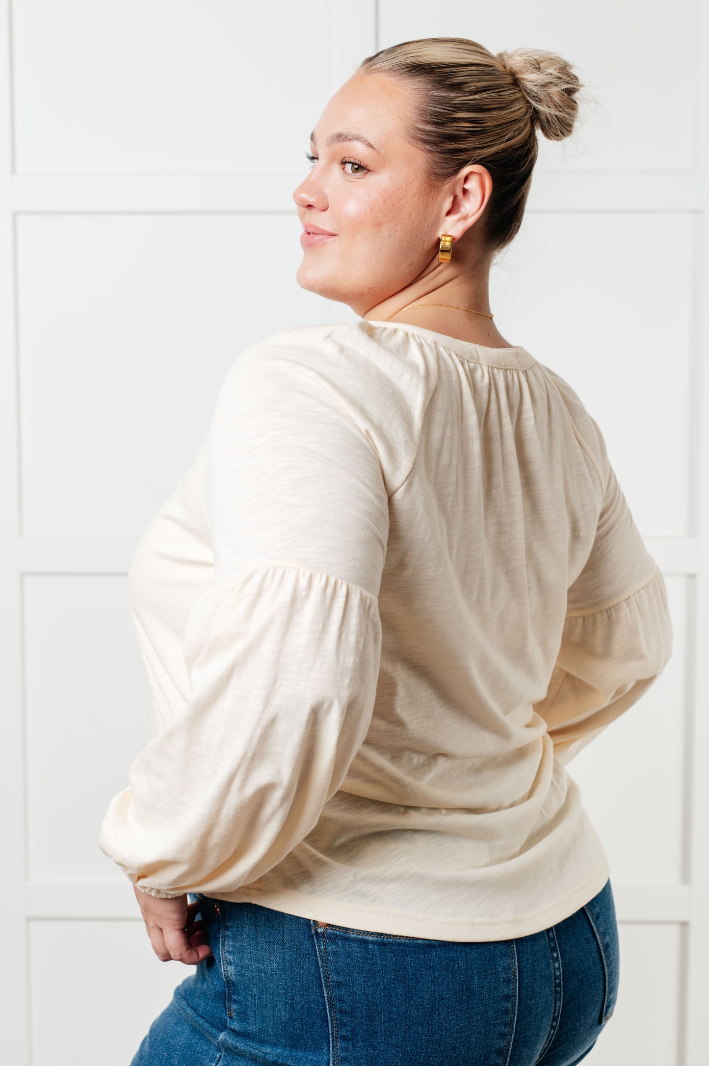 Long sleeve embroidered blouse
Lightweight Jersey Knit
Notched V-Neckline
Bishop Sleeve
Cased Elastic Sleeve Cuff
Lined Front Bodice
Scooped Hem
Machine Embroidered Details
65% Polyester, 35% Cotton
True to Size