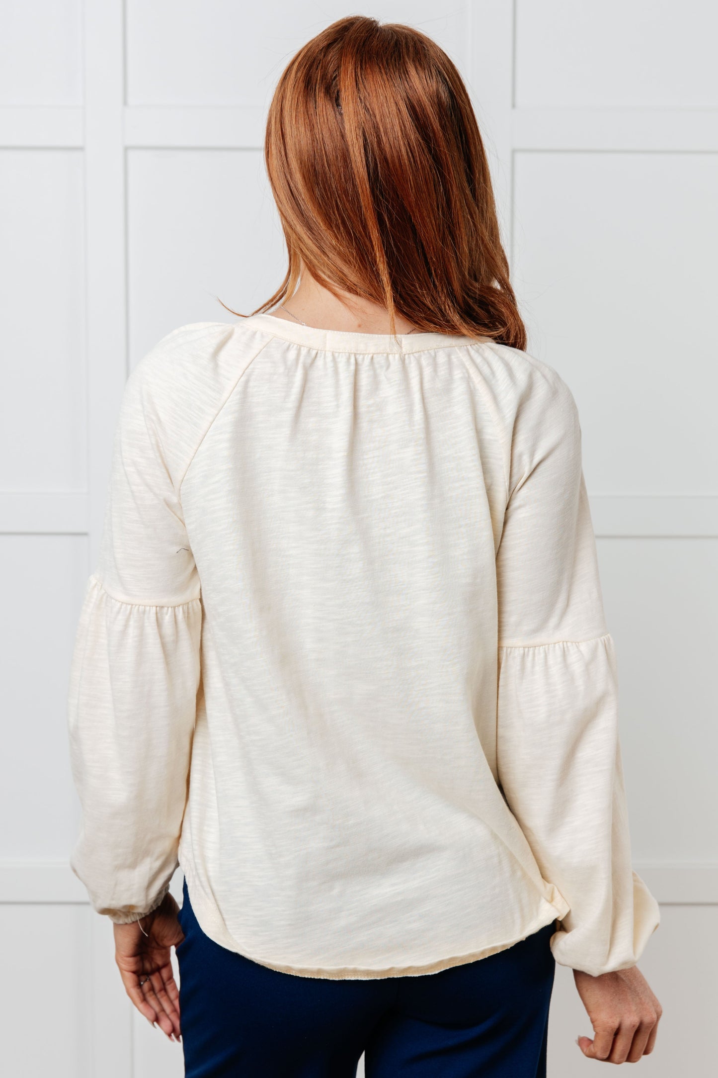 Long sleeve embroidered blouse
Lightweight Jersey Knit
Notched V-Neckline
Bishop Sleeve
Cased Elastic Sleeve Cuff
Lined Front Bodice
Scooped Hem
Machine Embroidered Details
65% Polyester, 35% Cotton
True to Size