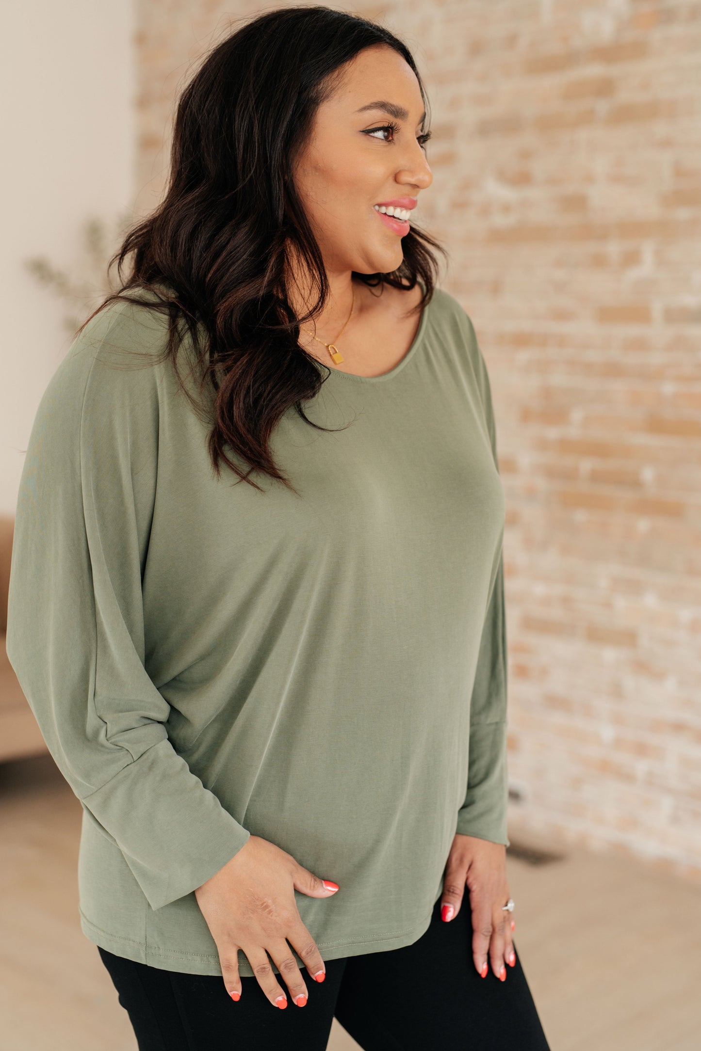 Brushed Microfiber in Olive by Sew In Love
Boat Neckline
Dolman Sleeve
Exaggerated Sleeve Cuff
70% Modal, 30% Polyester
True to Size