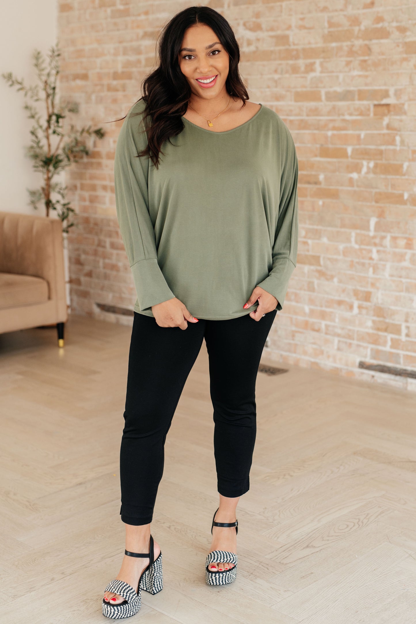 Brushed Microfiber in Olive by Sew In Love
Boat Neckline
Dolman Sleeve
Exaggerated Sleeve Cuff
70% Modal, 30% Polyester
True to Size