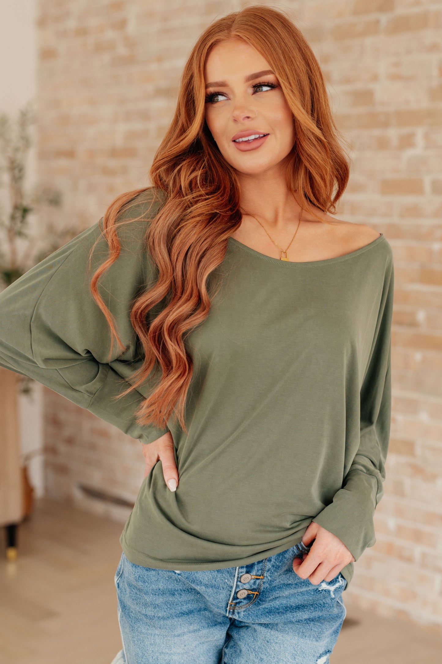 Brushed Microfiber in Olive by Sew In Love
Boat Neckline
Dolman Sleeve
Exaggerated Sleeve Cuff
70% Modal, 30% Polyester
True to Size