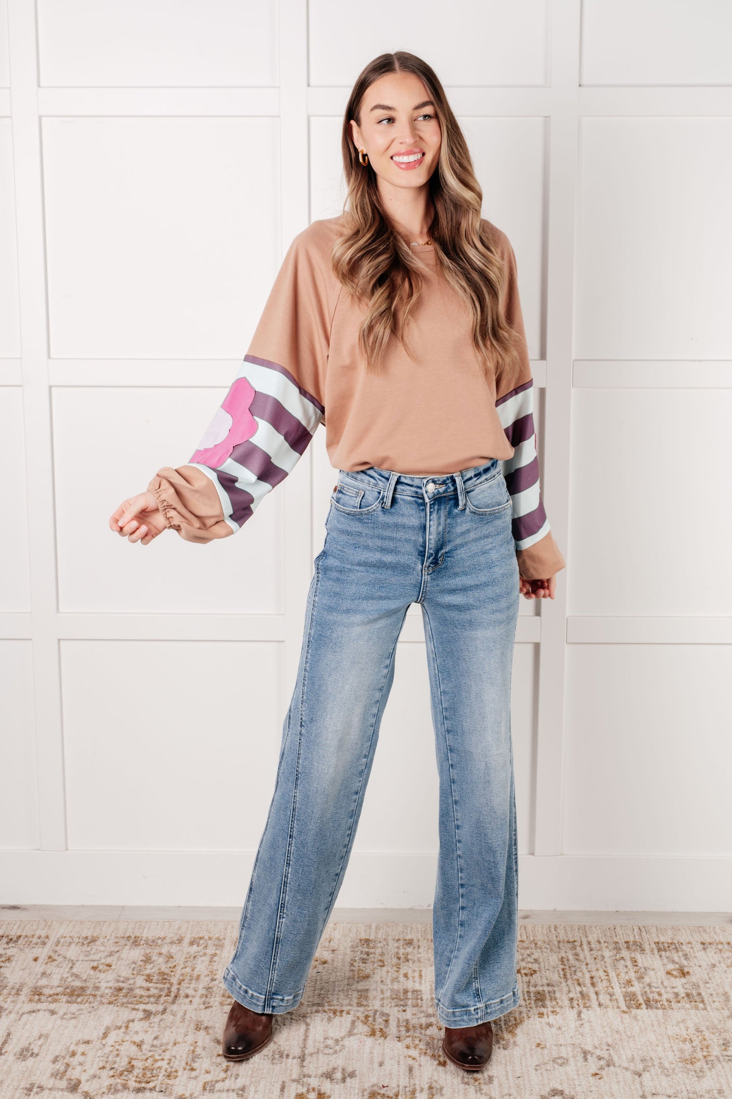 French Terry long sleeve top
Round Neckline
Dolman Balloon Sleeve
Cased Elastic Sleeve Cuff
Raw Edge Details
85% Polyester, 10% Cotton, 5% Elastane
True to Size