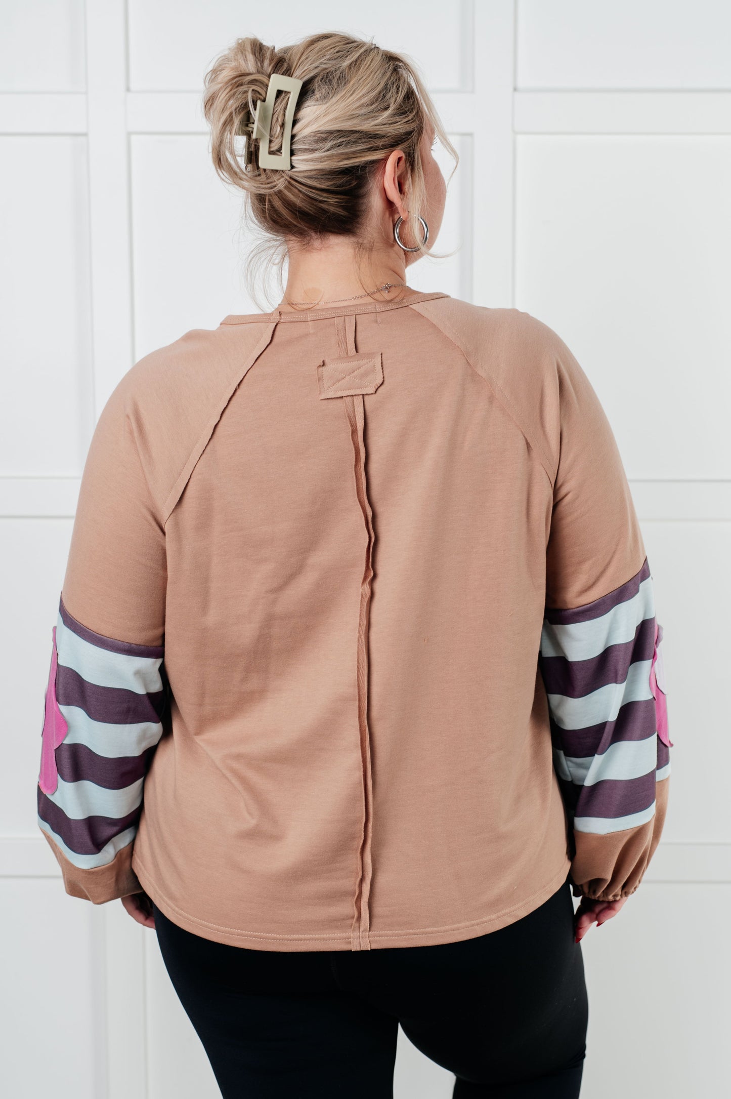 French Terry long sleeve top
Round Neckline
Dolman Balloon Sleeve
Cased Elastic Sleeve Cuff
Raw Edge Details
85% Polyester, 10% Cotton, 5% Elastane
True to Size