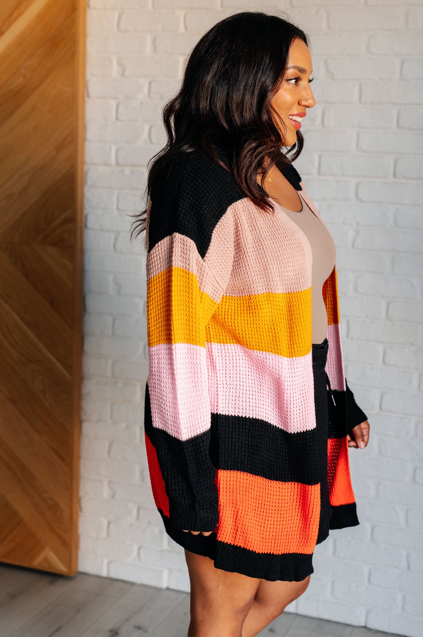 Striped Open Front Cardigan
Sweater Knit
Drop Shoulder
Open Front
Banded Ribbed Sleeve Cuff
Banded Ribbed Hemline
100% Acrylic
True to Size