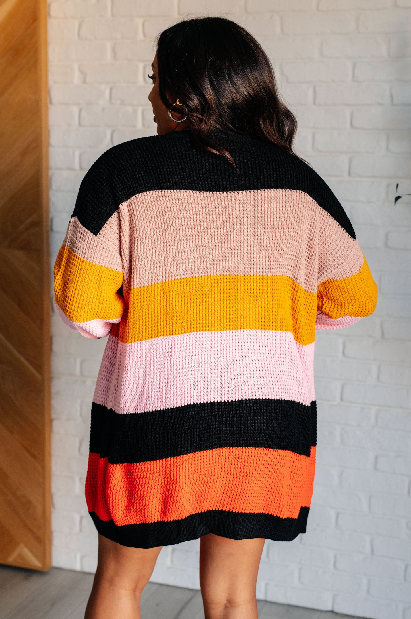 Striped Open Front Cardigan
Sweater Knit
Drop Shoulder
Open Front
Banded Ribbed Sleeve Cuff
Banded Ribbed Hemline
100% Acrylic
True to Size