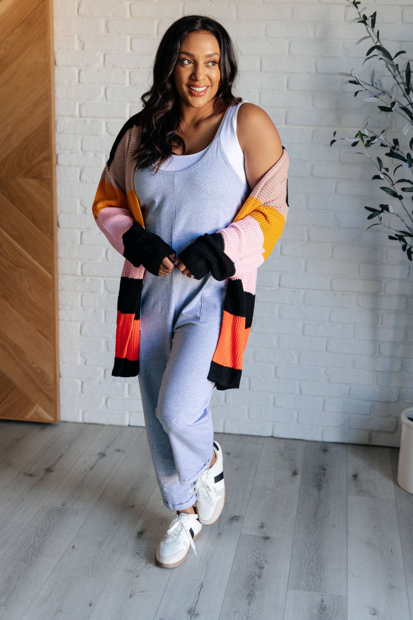 Striped Open Front Cardigan
Sweater Knit
Drop Shoulder
Open Front
Banded Ribbed Sleeve Cuff
Banded Ribbed Hemline
100% Acrylic
True to Size