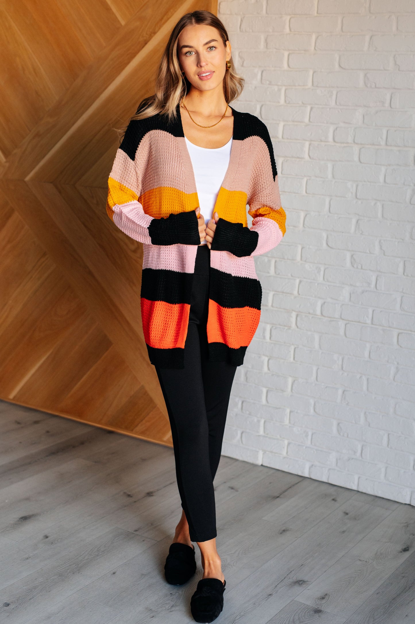 Striped Open Front Cardigan
Sweater Knit
Drop Shoulder
Open Front
Banded Ribbed Sleeve Cuff
Banded Ribbed Hemline
100% Acrylic
True to Size