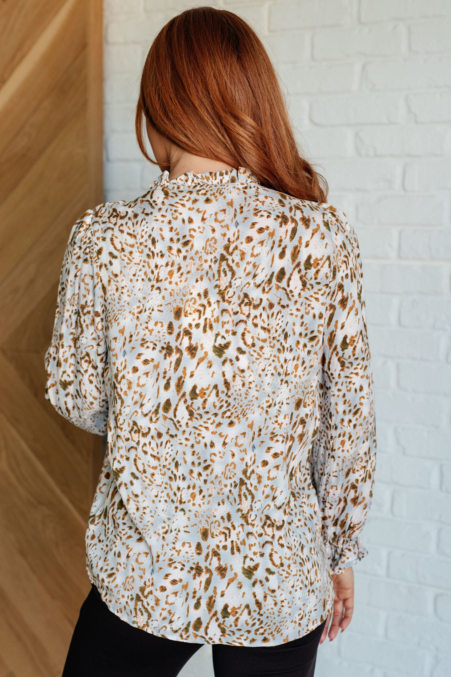 Long sleeve animal print Lightweight Woven top by Jodifil
Ruffled Neckline
Keyhole Tie Closure
Ruffled Elastic Sleeve Cuff
100% Rayon
True to Size