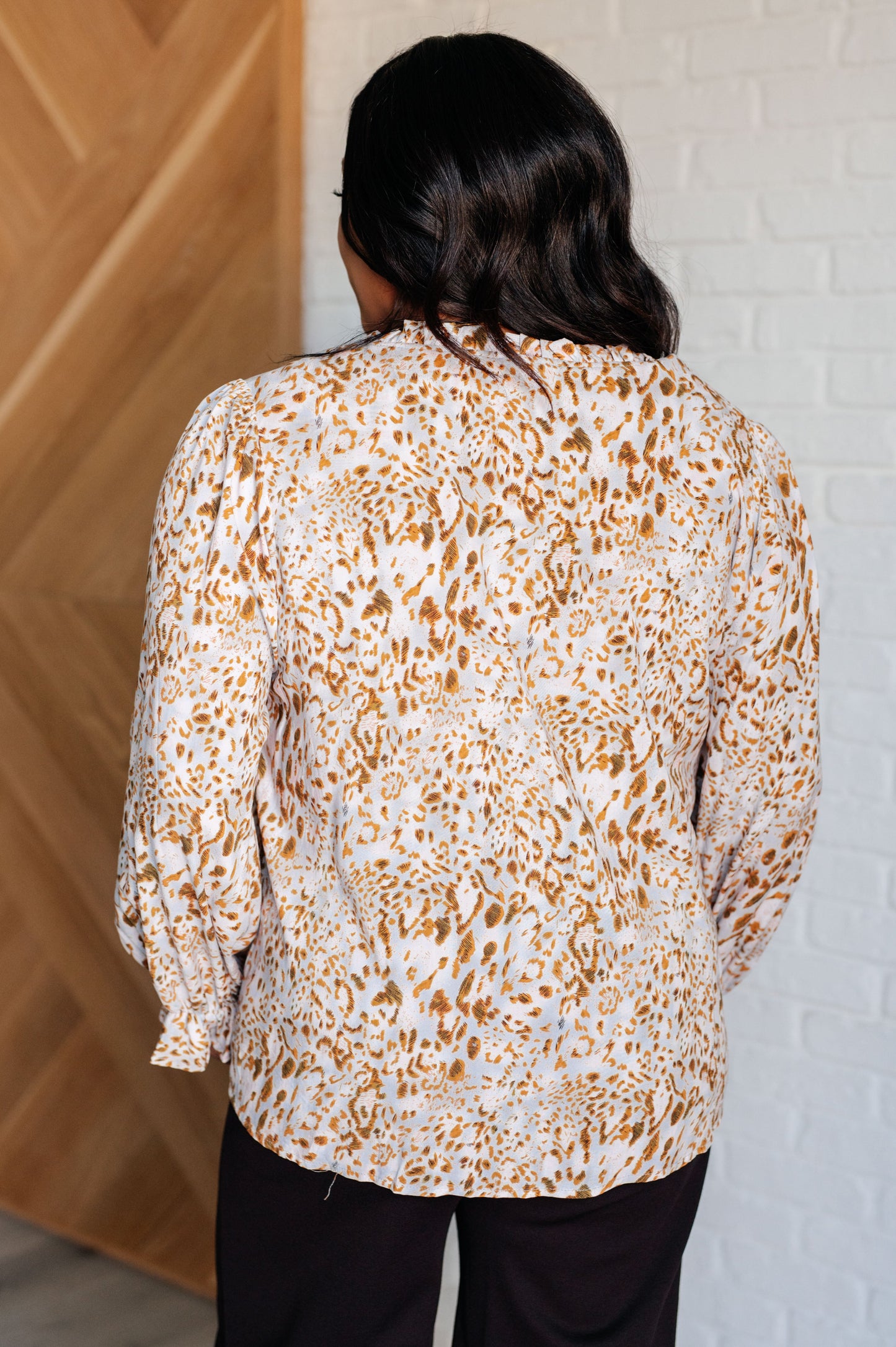 Long sleeve animal print Lightweight Woven top by Jodifil
Ruffled Neckline
Keyhole Tie Closure
Ruffled Elastic Sleeve Cuff
100% Rayon
True to Size