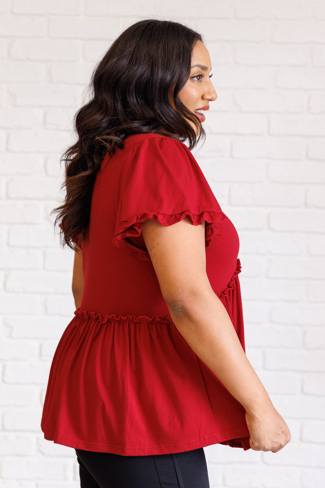 Red V Neck Short Sleeve Top
Jersey Knit
V-Neckline
Flutter Sleeve
Peplum Silhouette
Ruffle Details
65% Viscose, 30% Polyester, 5% Elastane
True to Size
