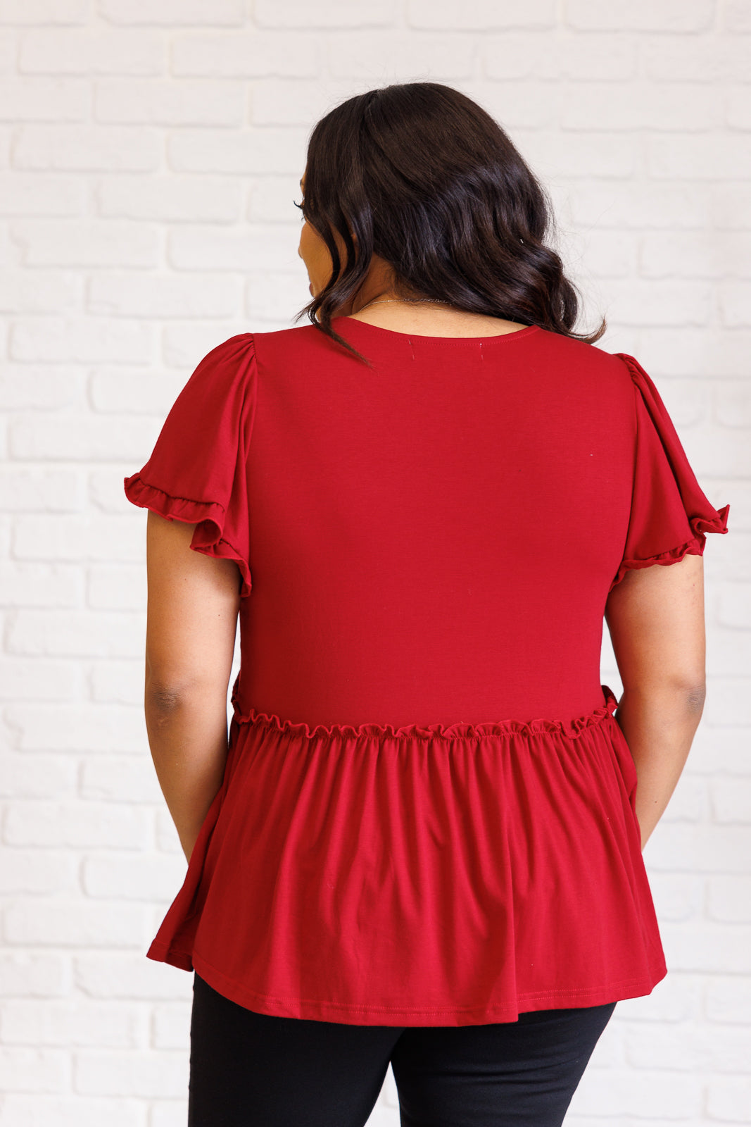 Red V Neck Short Sleeve Top
Jersey Knit
V-Neckline
Flutter Sleeve
Peplum Silhouette
Ruffle Details
65% Viscose, 30% Polyester, 5% Elastane
True to Size