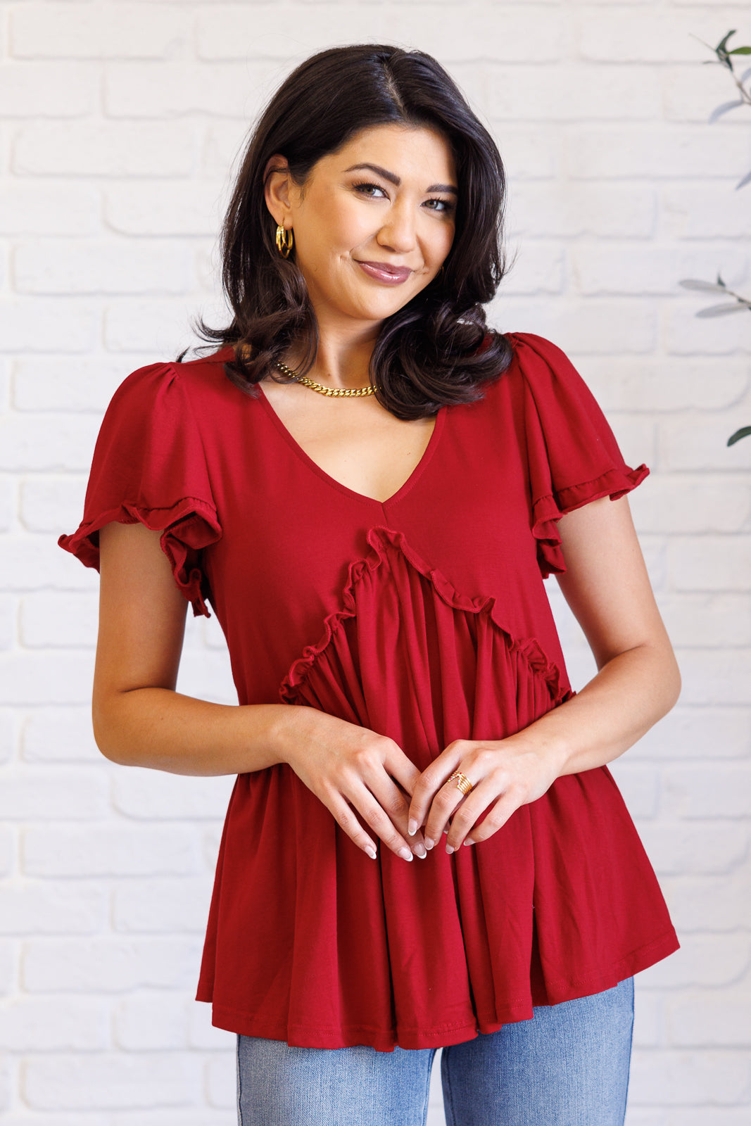 Red V Neck Short Sleeve Top
Jersey Knit
V-Neckline
Flutter Sleeve
Peplum Silhouette
Ruffle Details
65% Viscose, 30% Polyester, 5% Elastane
True to Size