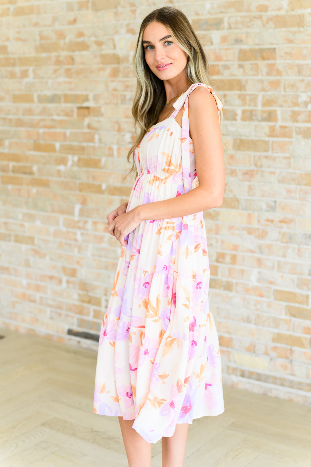 Floral Midi Dress
Lightweight Woven
Functional Tie Straps
Elastic Waistband
Tiered Skirt
Fully Lined
100% Polyester
True to Size