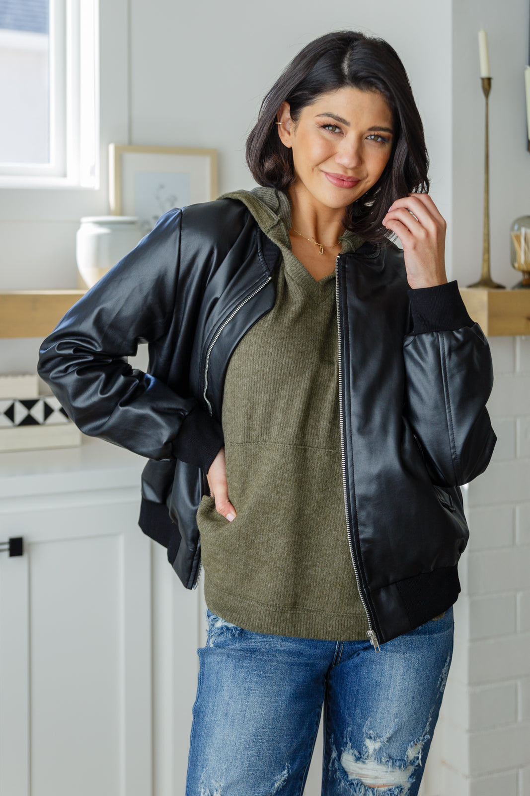 Olive Ribbed Jersey Knit Hooded Poncho by White Birch
Hooded V-Neckline
Poncho Style
Tacked Sides
Kangaroo Pocket
78% Polyester, 18% Rayon, 4% Spandex
True to Size, Oversized Fit