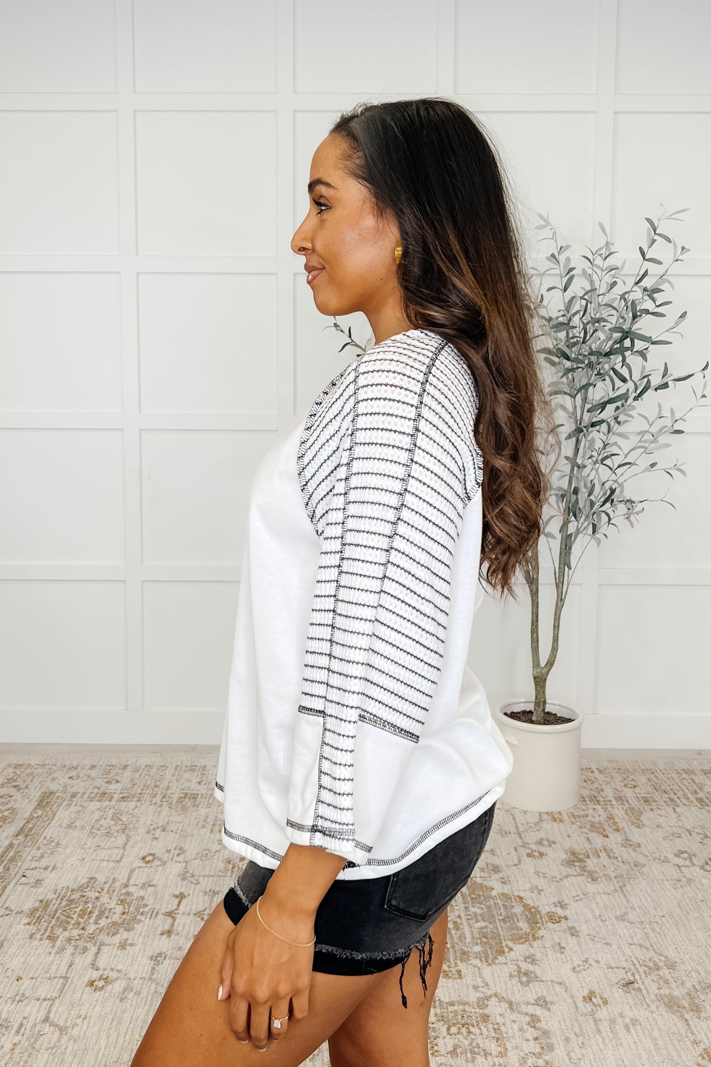 Black striped, soft, French terry, exposed seam top