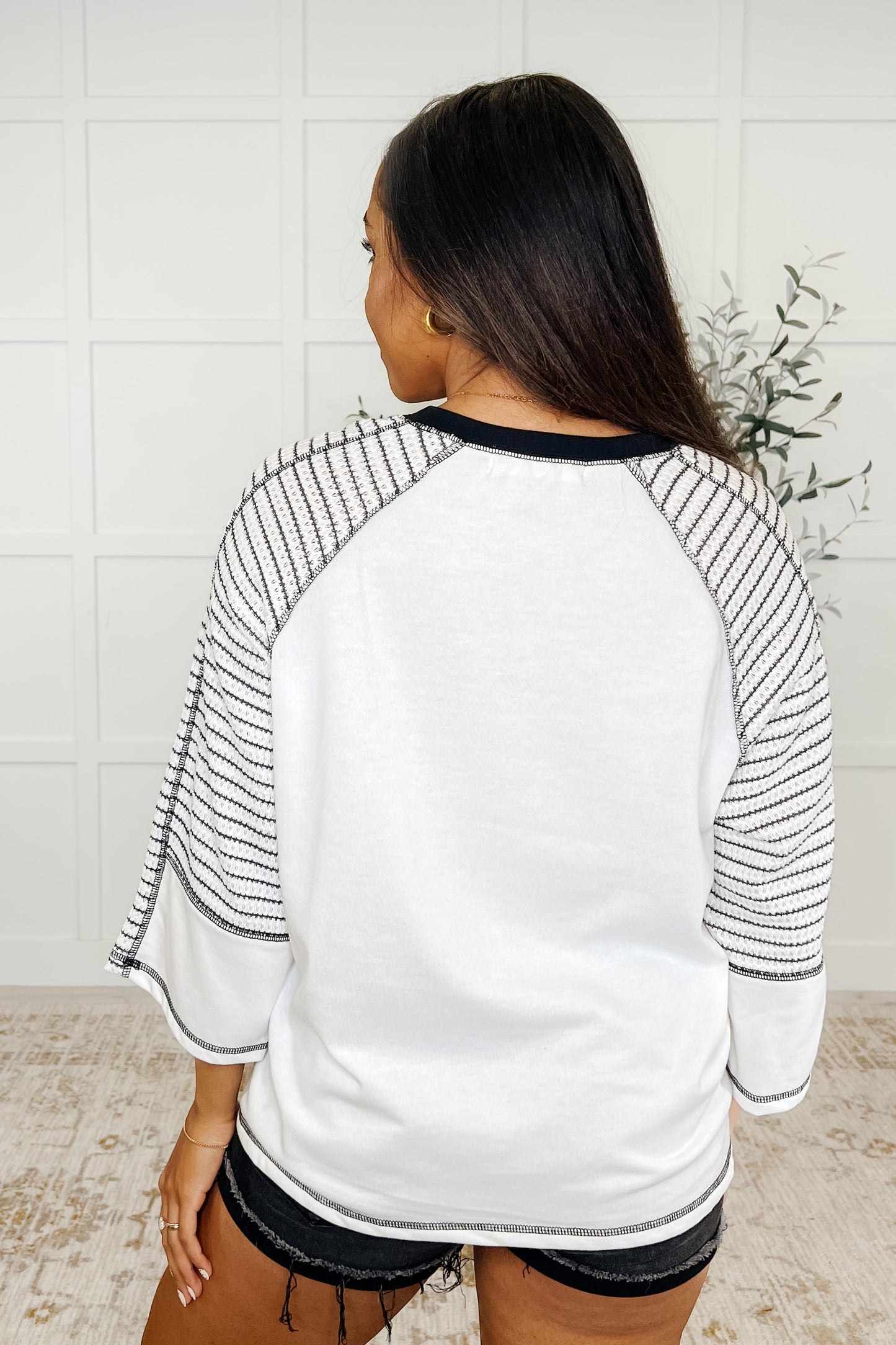 Black striped, soft, French terry, exposed seam top