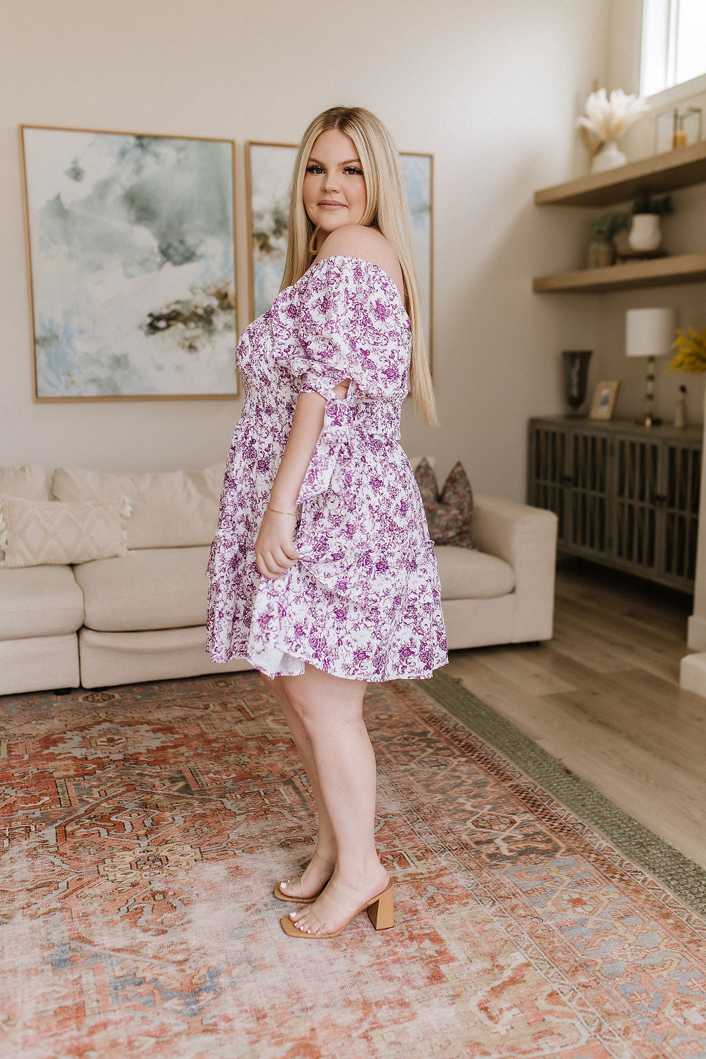 Lightweight Woven
Smocked Bodice
Elastic Neckline
Ruffled Tiered Skirt
Functional Sleeve Ties
Short Babydoll Cut
100% Polyester
True to Size floral dress by White Birch